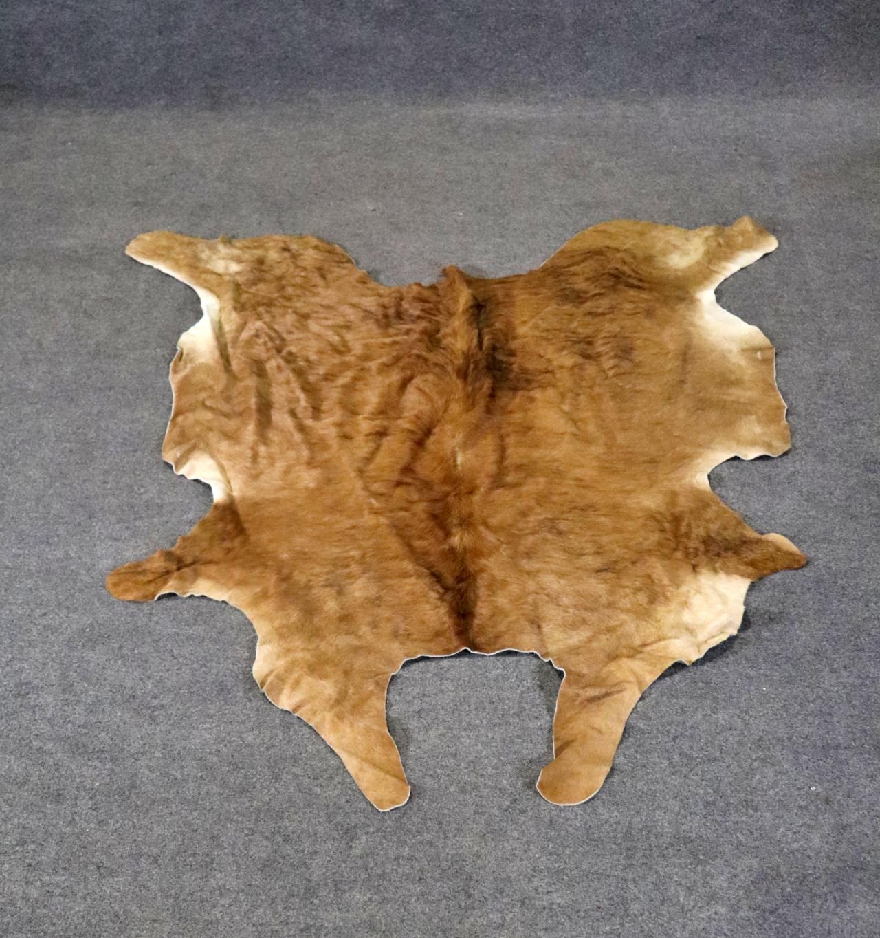 Large cow hide rug measuring over six feet. Beautiful style for your modern or rustic style home.
Please confirm location NY or NJ