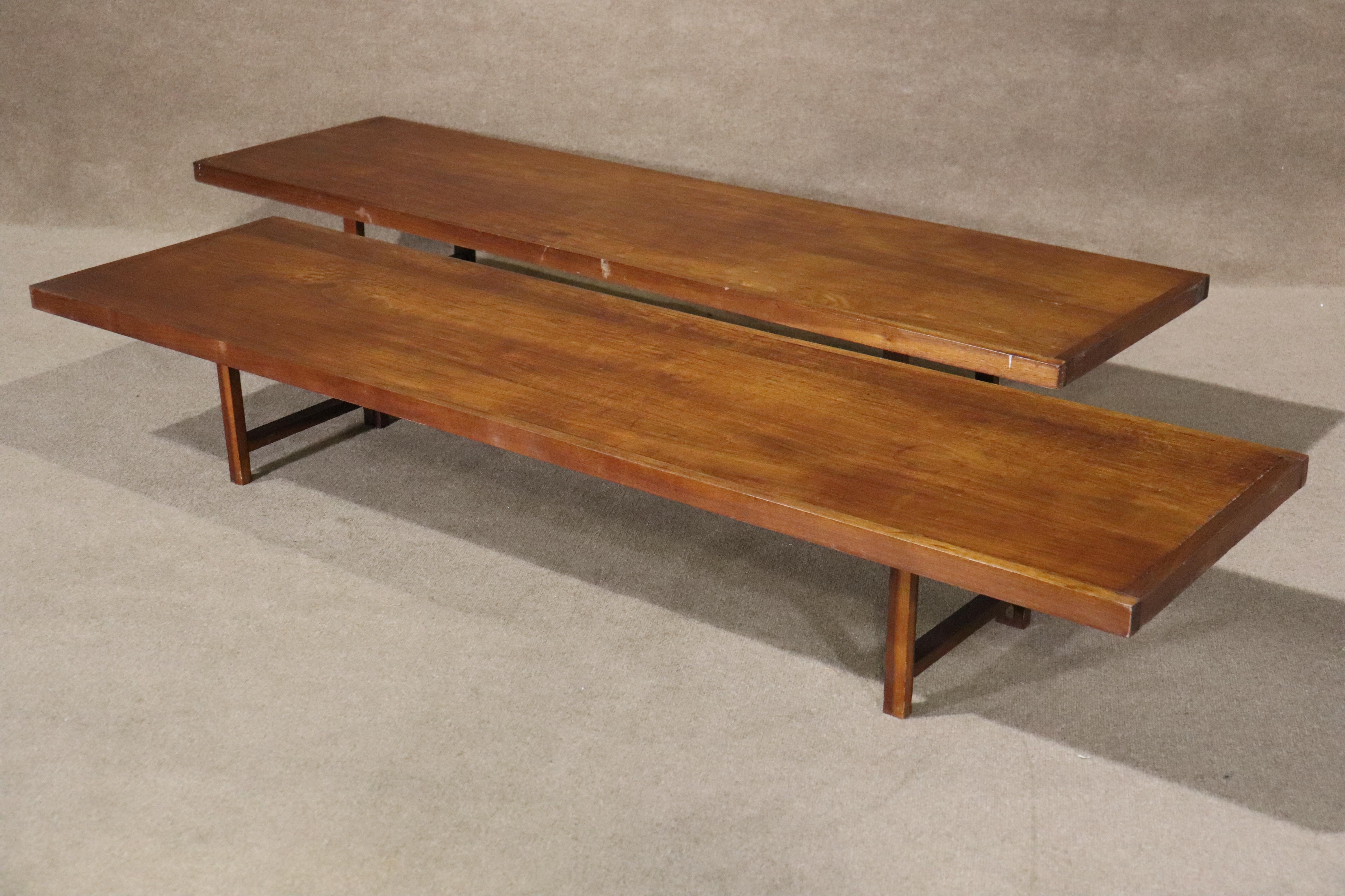 Extra long Danish coffee table. Very similar to the design of Torbjørn Afdal, this table is simple and handsome, with a single board and trestle-shaped legs.
Listing is for a single table.
Please confirm location NY or NJ