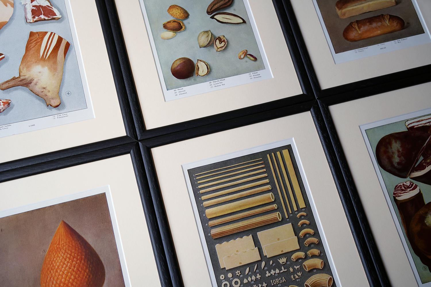 The group of six framed and glazed offset lithograph prints, showing a mixture of foodstuffs in profile, of pasta, meats, nuts, breads and cheeses, taken from 