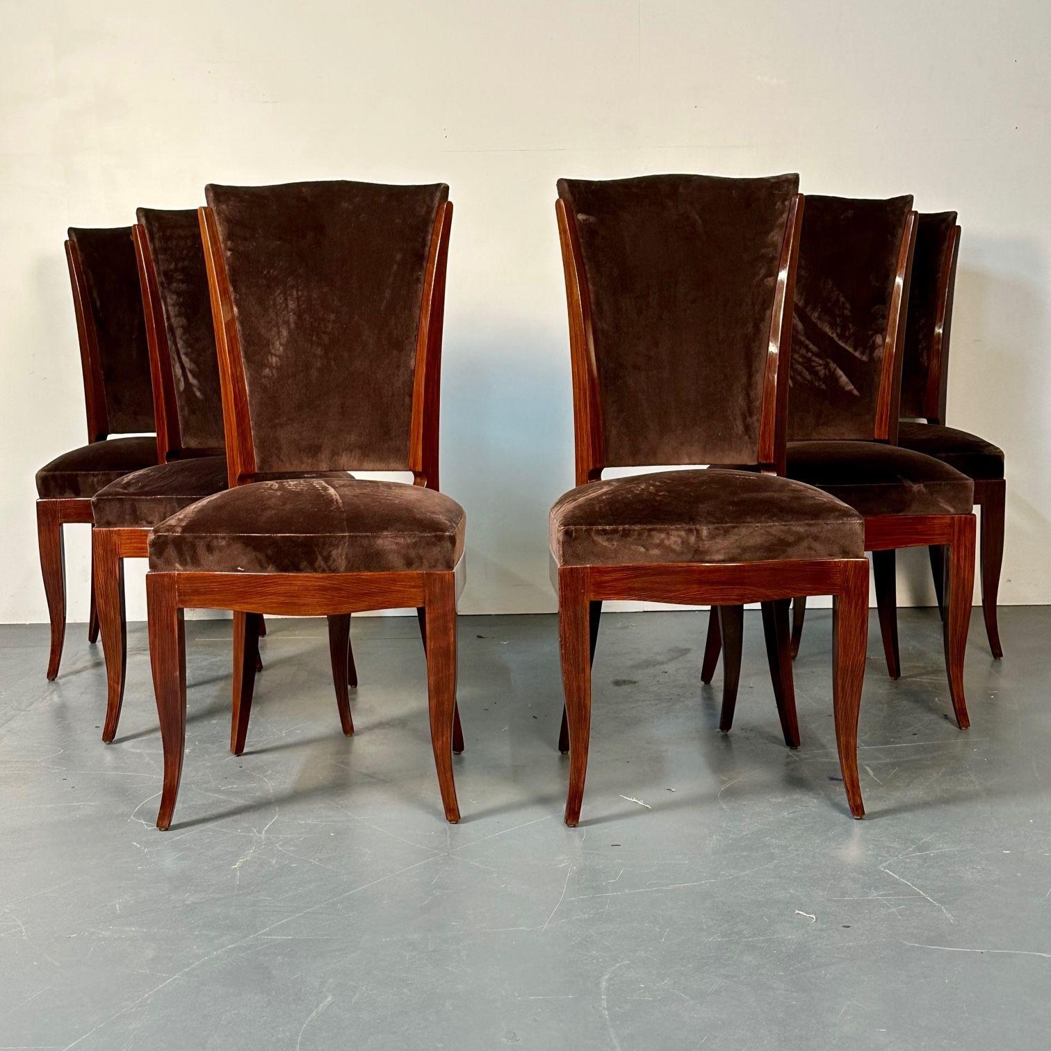 Six French Art Deco Walnut Dining / Side Chairs, Brown Velvet, Ruhlman Style
 
Set of 6 polished walnut and brown velvet dining or side chairs. Emile-Jacques Ruhlman style.
 
Polished Walnut, Fabric
France, 1940s
 
41H x 19W x 21D  / SH 19
 
EXAA