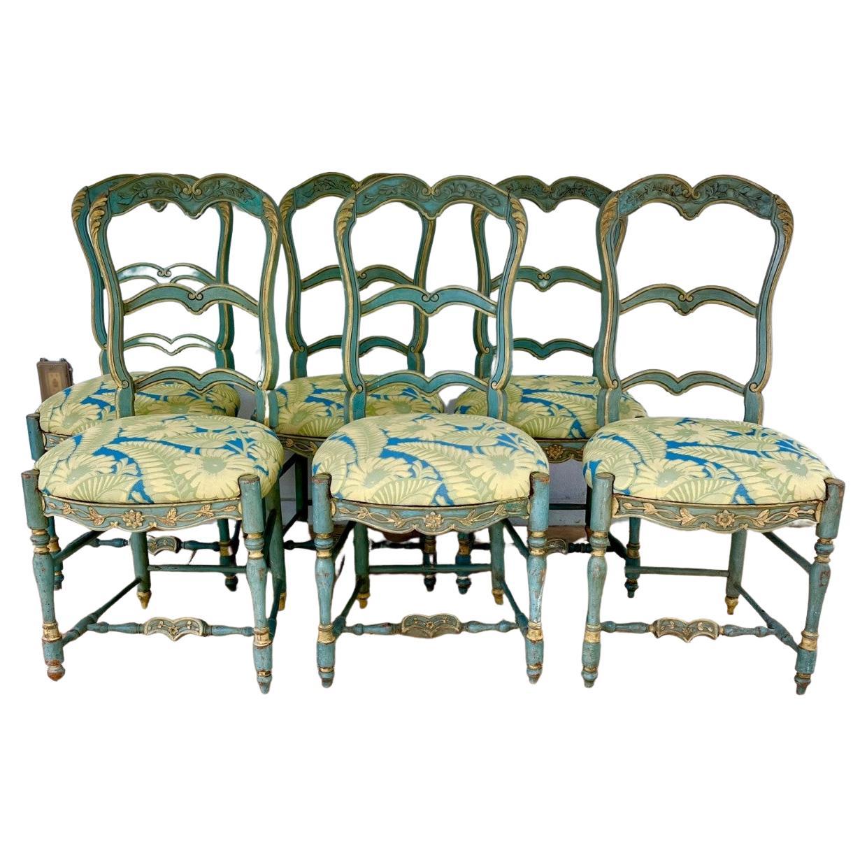Six French country ladderback painted dining chairs early 19th century.

Superb quality set of 6 antique French Louis XV Baroque style carved fruit wood provincial ladderback dining chairs. The top rail has a finely carved floral motif which also