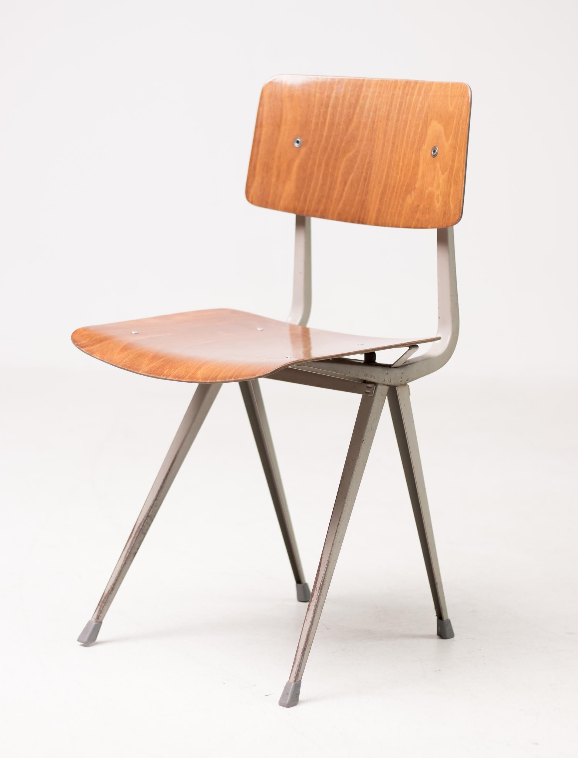 Set of six result chairs, designed by Friso Kramer for Ahrend-De Cirkel in 1952.
Innovative bent sheet steel frame with pressed wood seat and back.
Embossed logo.