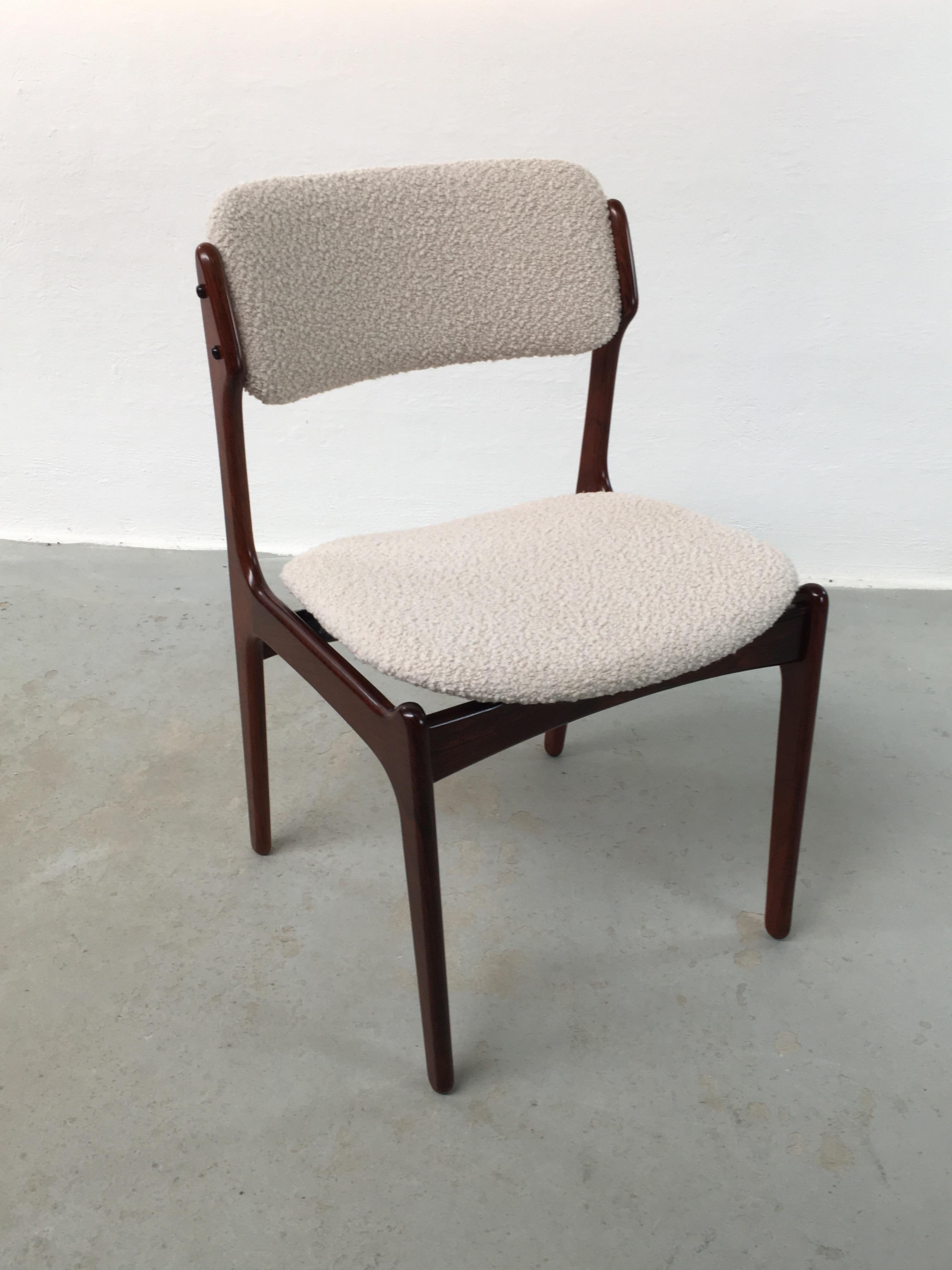 Six fully restored Erik Buch rosewood dining chairs, custom Reupholstery.

The set consists of 4 rosewood Erik Buch dining chairs and two rosewood Erik Buch armchairs with floating seats 

The chairs have a simple yet solid construction with