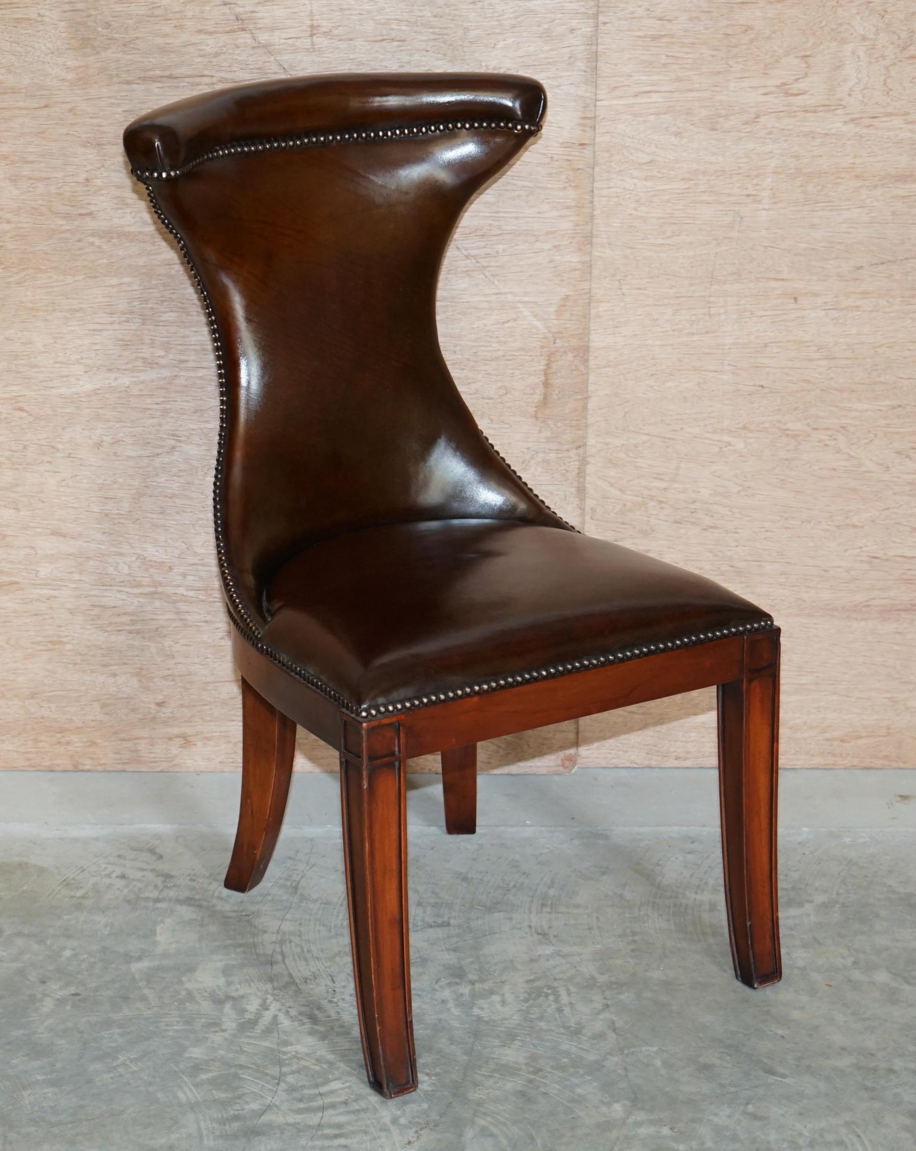 We are delighted to this stunning suite of six fully restored Ralph Lauren hand dyed cigar brown leather dining chairs

These are a very fine, highly decorative and extremely comfortable suite of chairs, made by Ralph Lauren, upholstered with