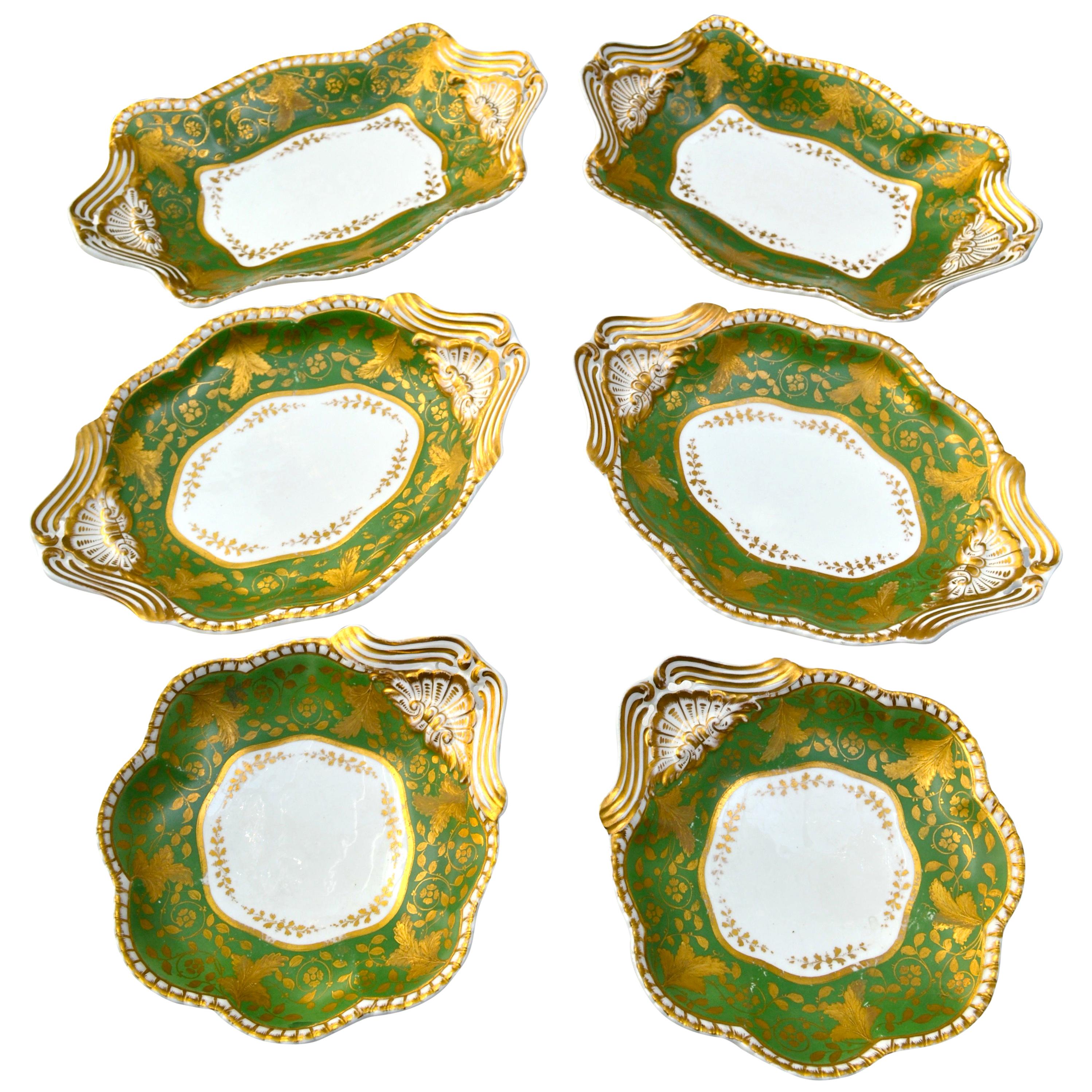 These six hand painted English porcelain plates in oval scallop and rectangular shapes are from a service made in Staffordshire by Spode during the late Georgian period. The undersides of all six plates has the 'Spode Felspar Porcelain' 4292 mark