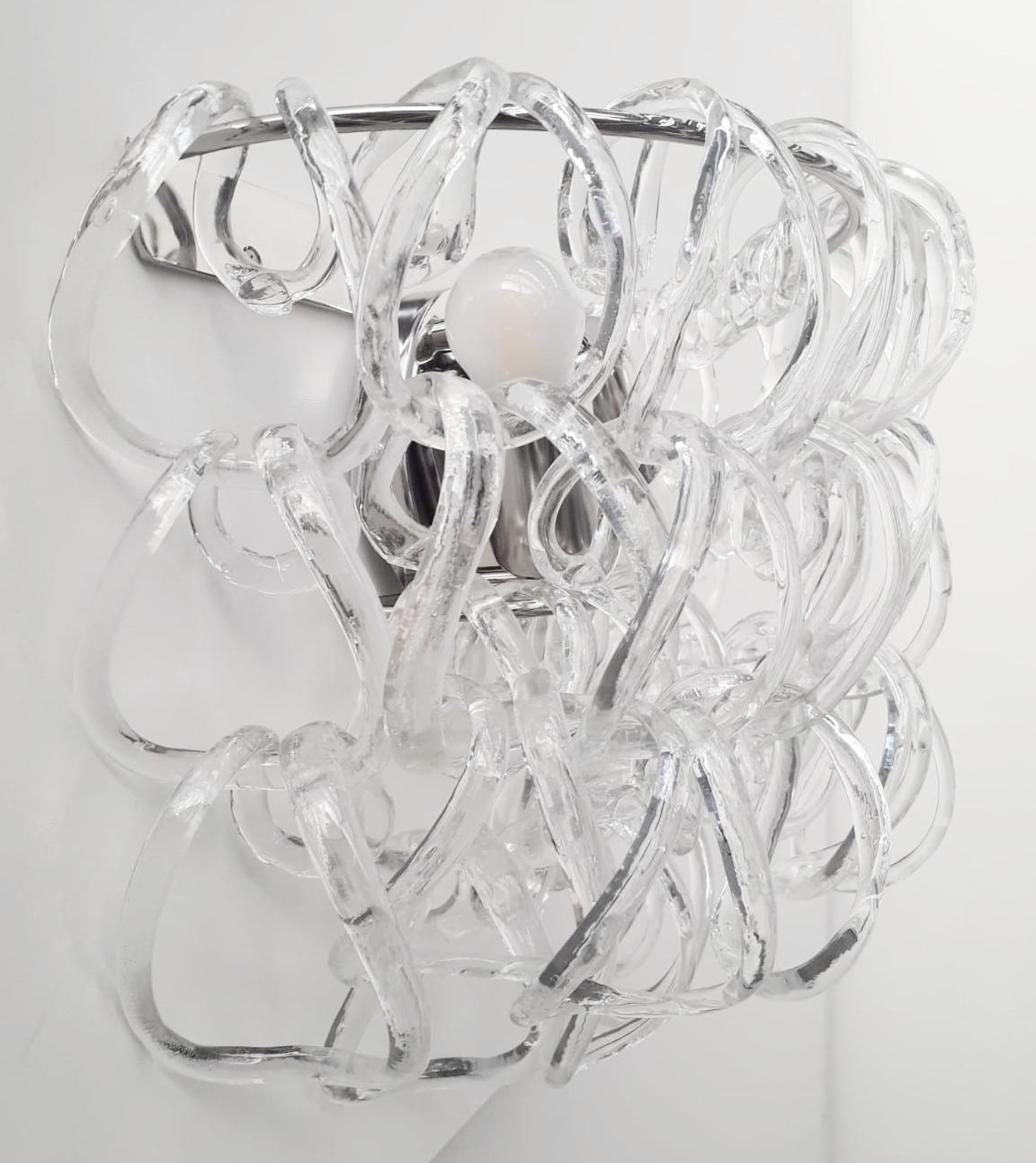 Applique d'epoca della serie Giogali con maglie in vetro di Murano trasparente fatte a mano, montate su una struttura in metallo cromato / Disegnate da Angelo Mangiarotti, circa anni '60 / Made in Italy
2 luci / tipo E12 o E14 / max 40W