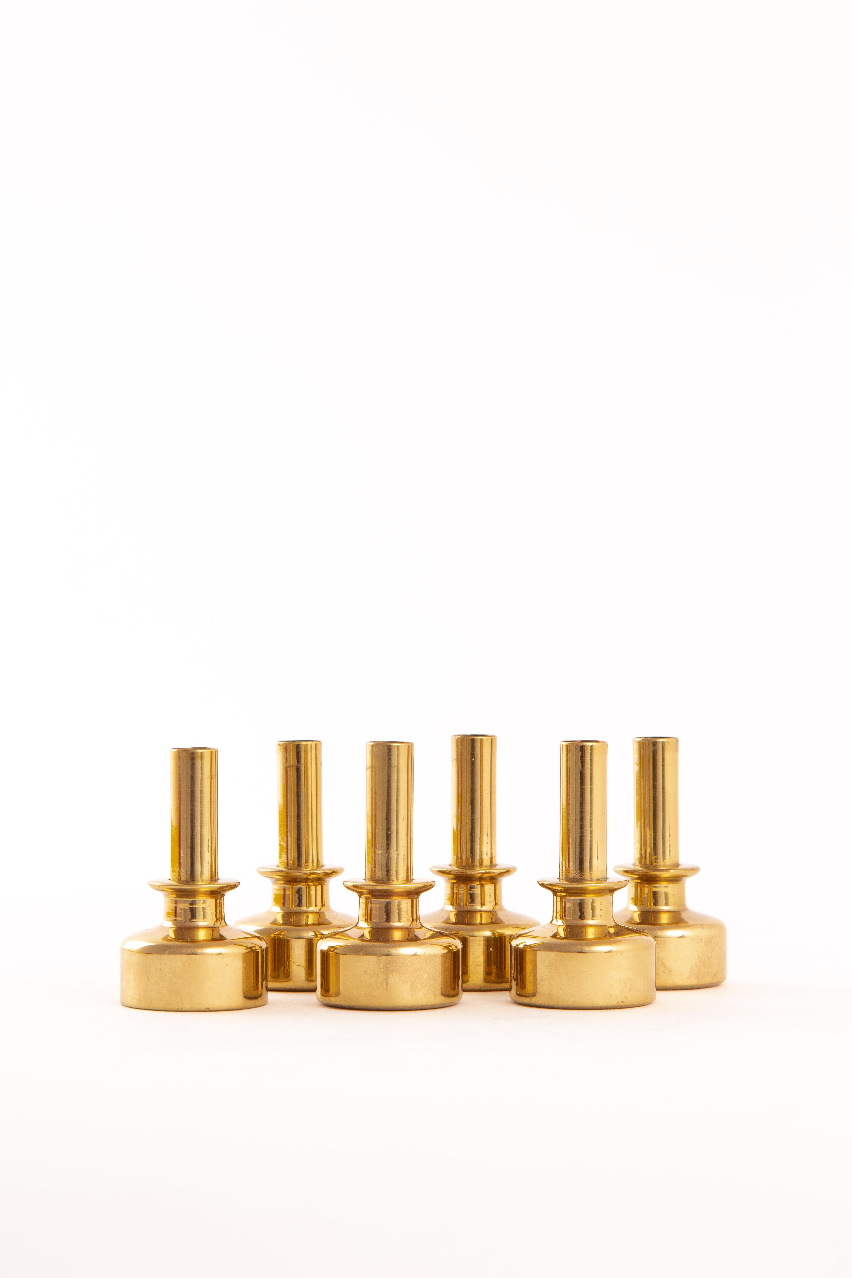 Six Hans-Agne Jakobsson candles in brass. Marked on the bottom L92. In perfect condition.