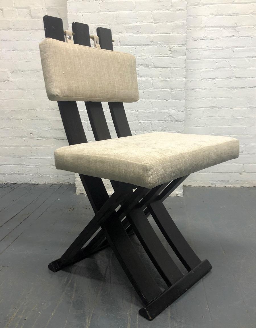 Six Harvey Probber dining chairs that have seat and upper back cushions upholstered in an off-white fabric with a wood frame.