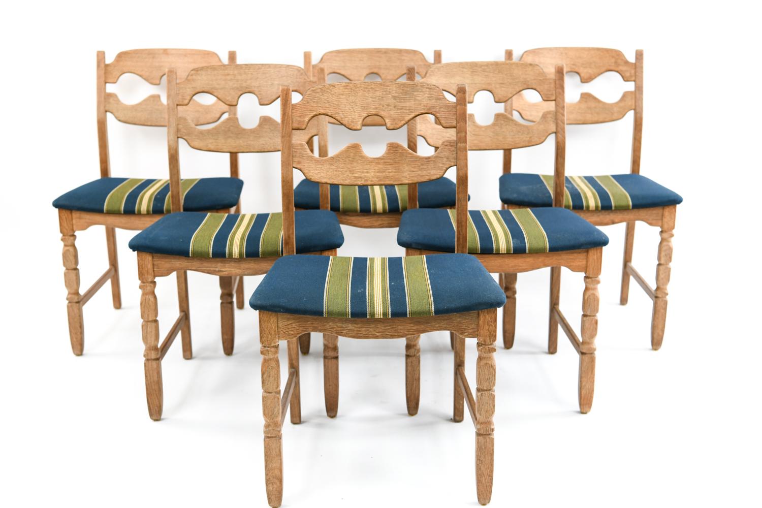 A set of six dining/side chairs designed by Henning Kjaernulf of the model 