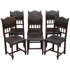 Six Henry II circa 1880 French Oak and Embossed Crocodile Leather Dining Chairs