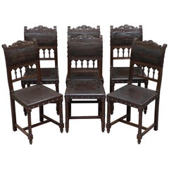 Used Six Henry II circa 1880 French Oak and Embossed Crocodile Leather Dining Chairs 