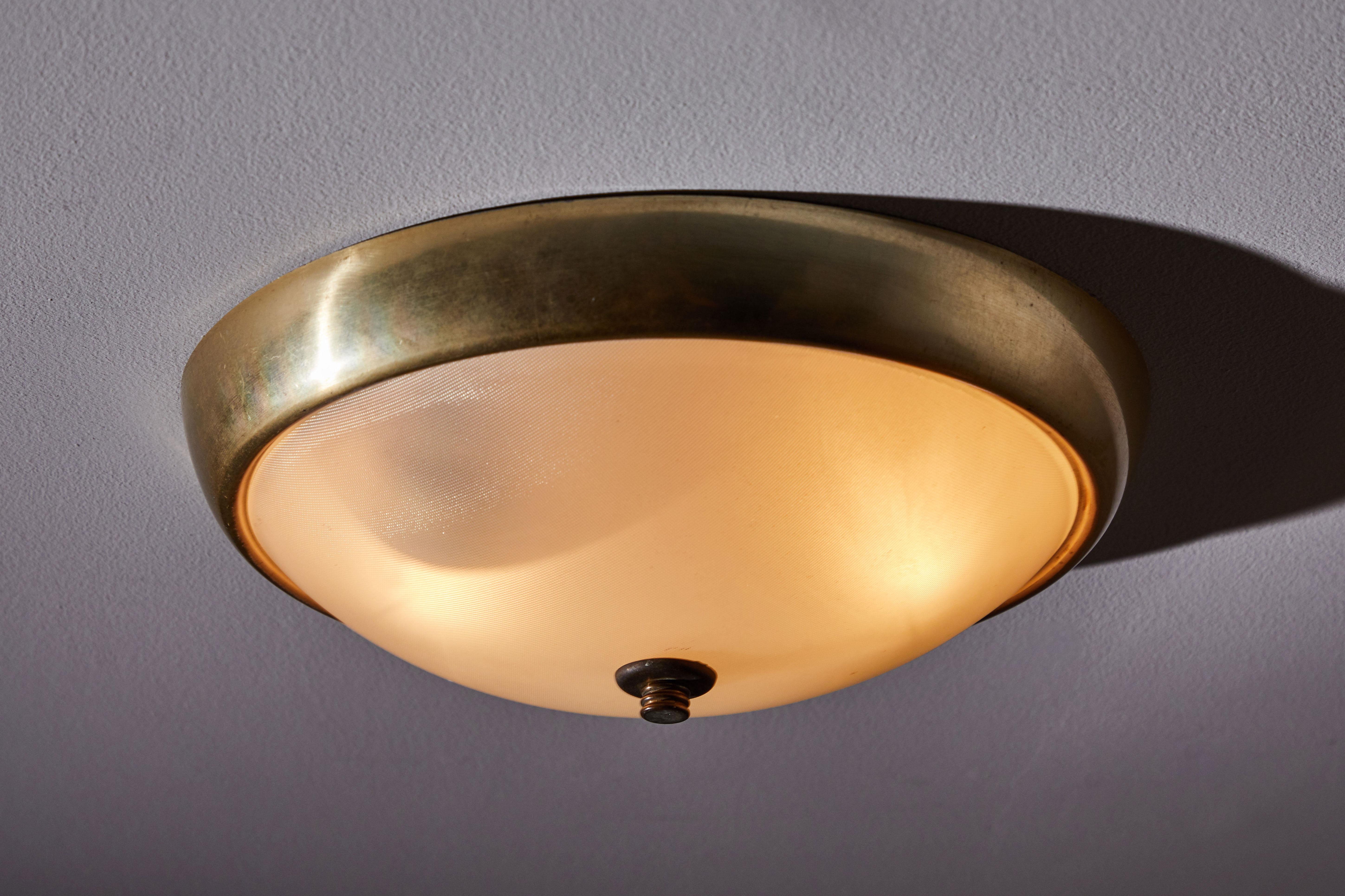 Six Italian ceiling lights. Manufactured in Italy circa 1950s. Brass and holophane glass. Rewired for US junction boxes. Each light takes two E27 60w maximum bulbs. Priced and sold individually.