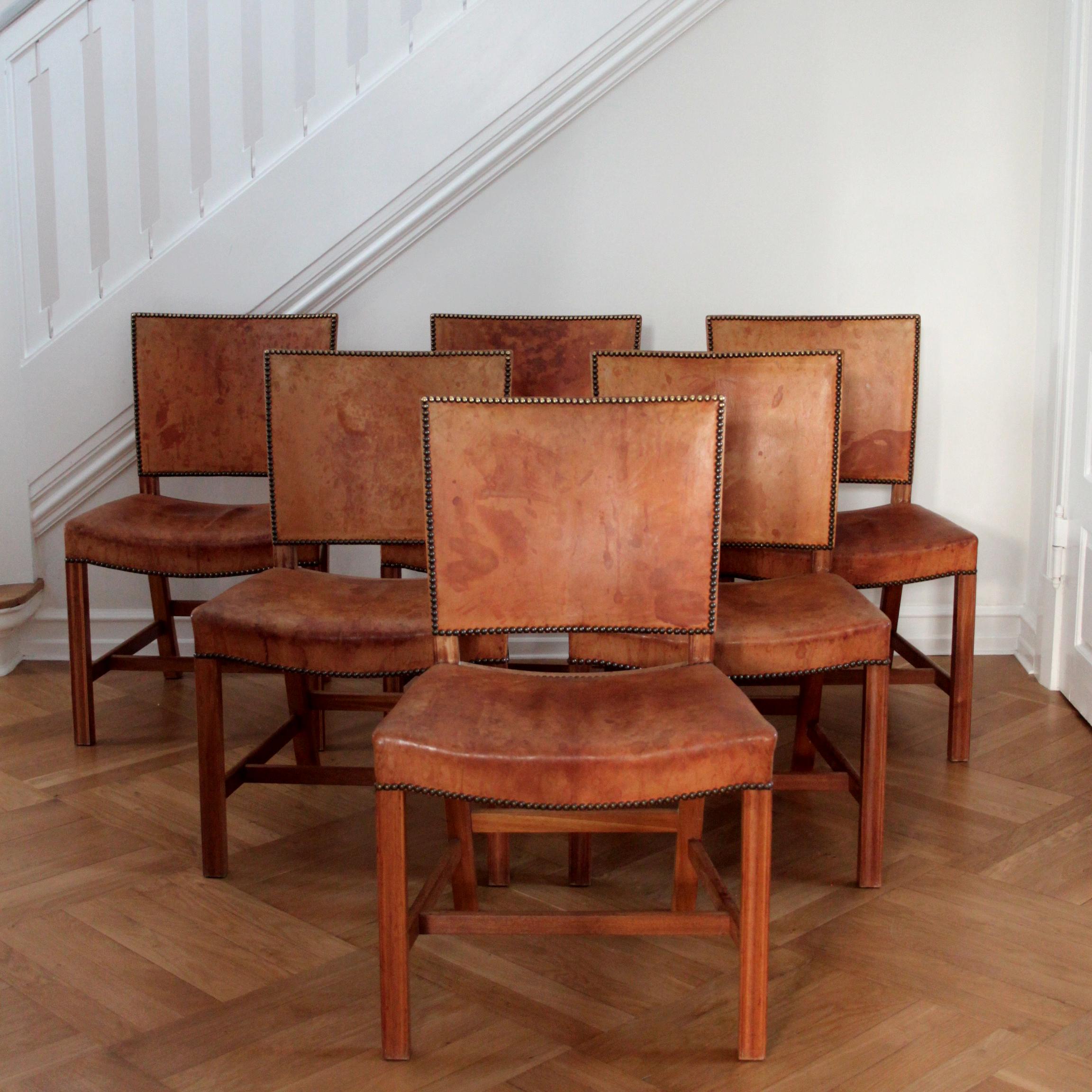 KAARE KLINT & RUD RASMUSSEN  - SCANDINAVIAN MODERN

A beautiful set of six Kaare Klint 'Red Chair' or 'Barcelona Chair' by Kaare Klint with deep patina in original Niger leather, profiled legs of mahogany and brass nails.

These examples made circa