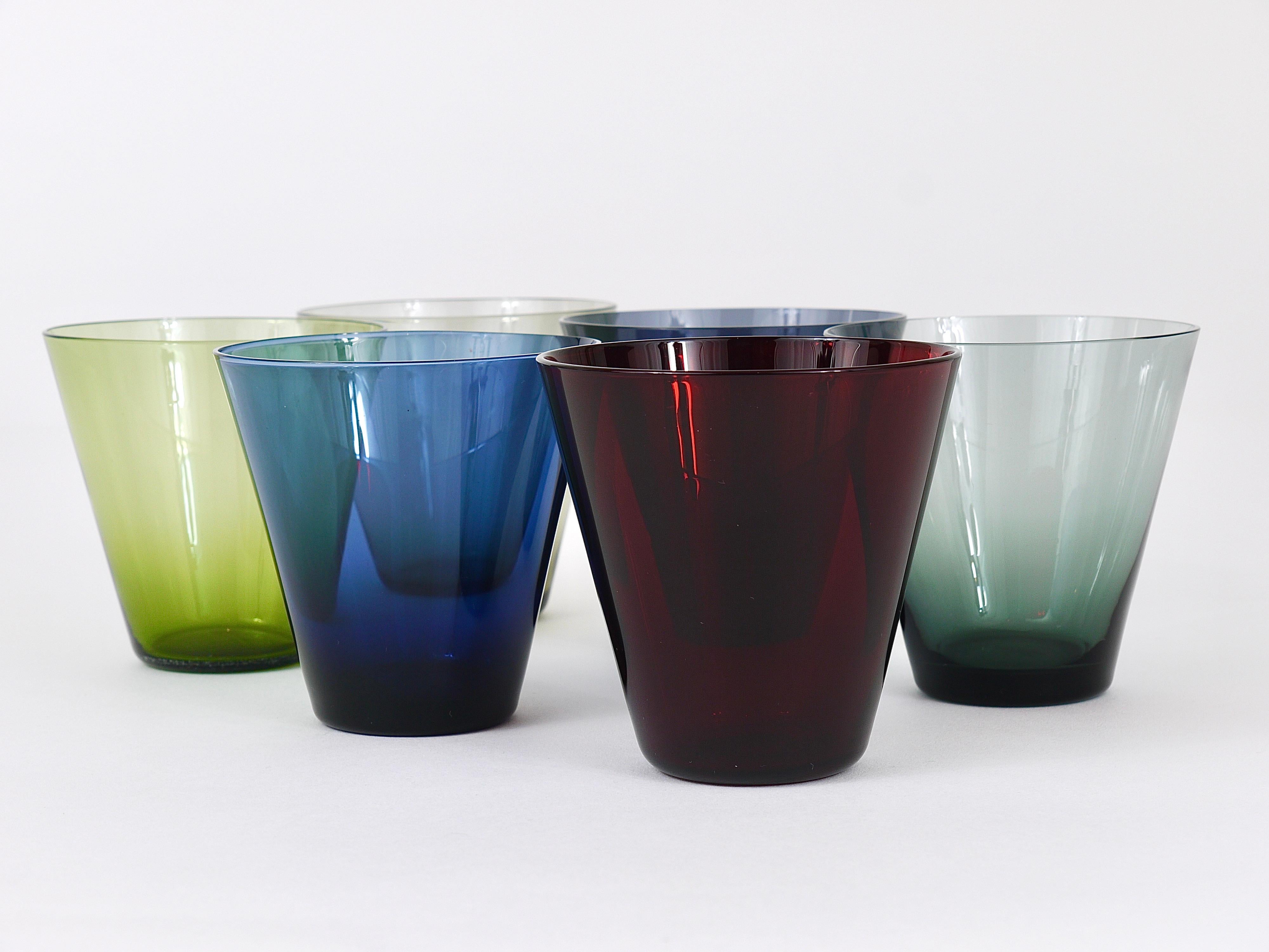 A set of six fine Kartio drinking glasses in six different colors from the 1950s. Designed by Kaj Franck, executed by Nuutajarvi Nottsjo Finland. In excellent condition.