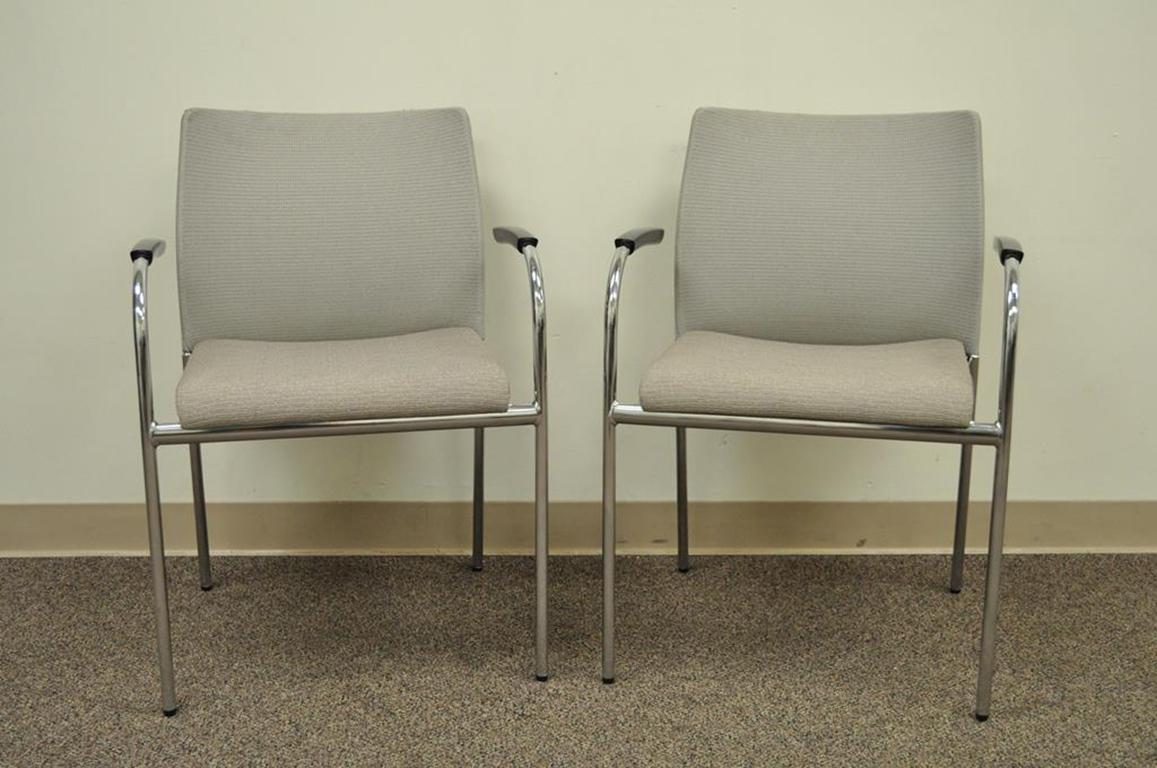 Set of six Keilhauer flit-3813 modern chrome stacking office armchairs. Sleek modern design, curved backs, floating arms and clean lines. MSRP: $585 each, circa 21st century, Canada. Measurements: 32