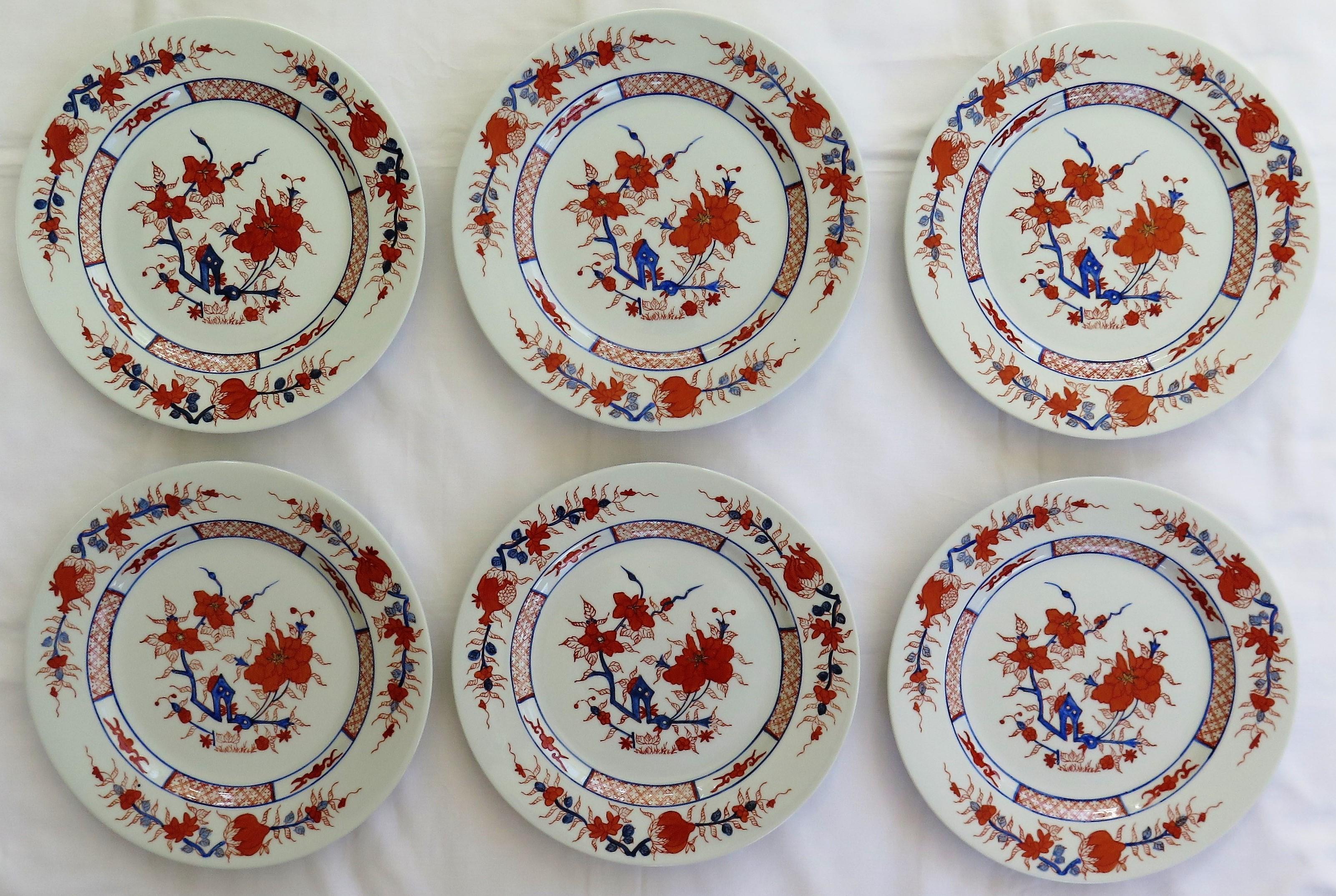 These are a very good set of six large Chinese Export porcelain dinner plates.

Each plate is hand decorated in a bold floral imari pattern using brick red and cobalt blue enamels in various shades.The plates have various borders including an