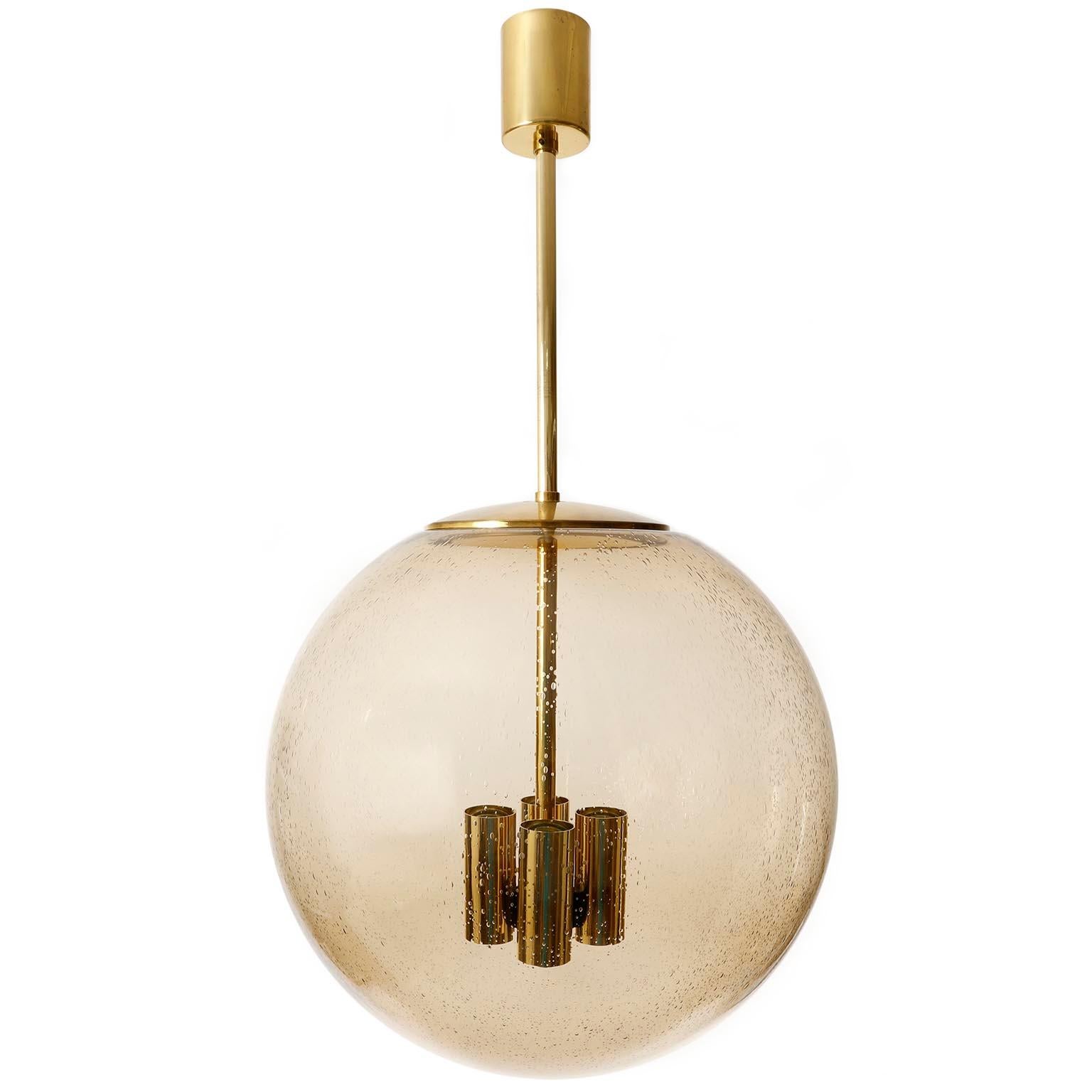 Mid-Century Modern One of Six Large Limburg Globe Pendant Lights, Brass Amber Smoked Glass, 1970s For Sale