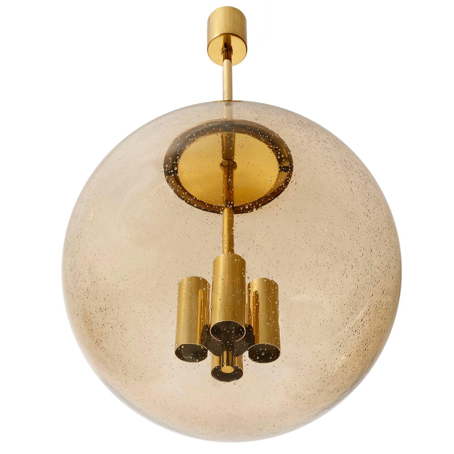 German One of Six Large Limburg Globe Pendant Lights, Brass Amber Smoked Glass, 1970s For Sale