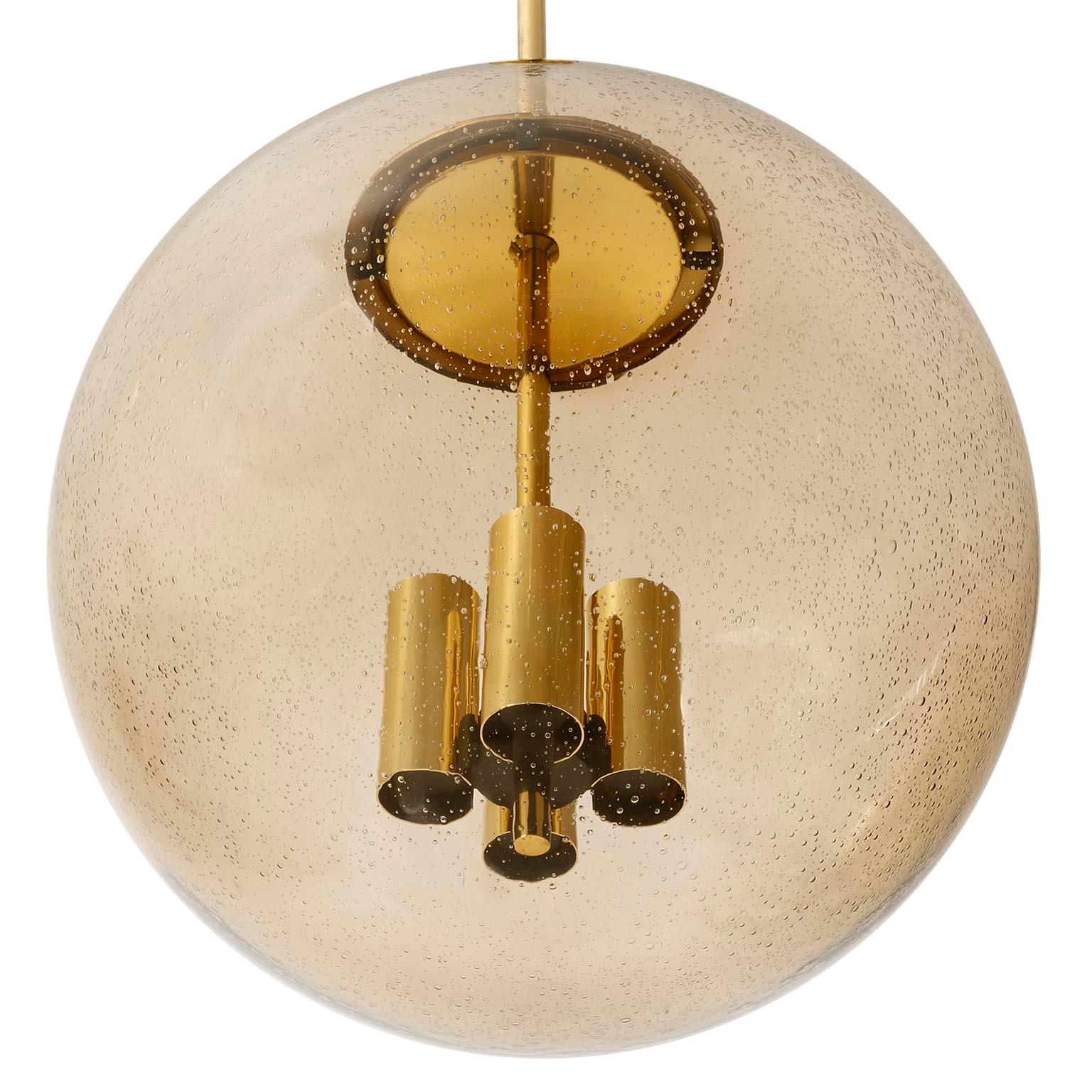 One of Six Large Limburg Globe Pendant Lights, Brass Amber Smoked Glass, 1970s For Sale 1