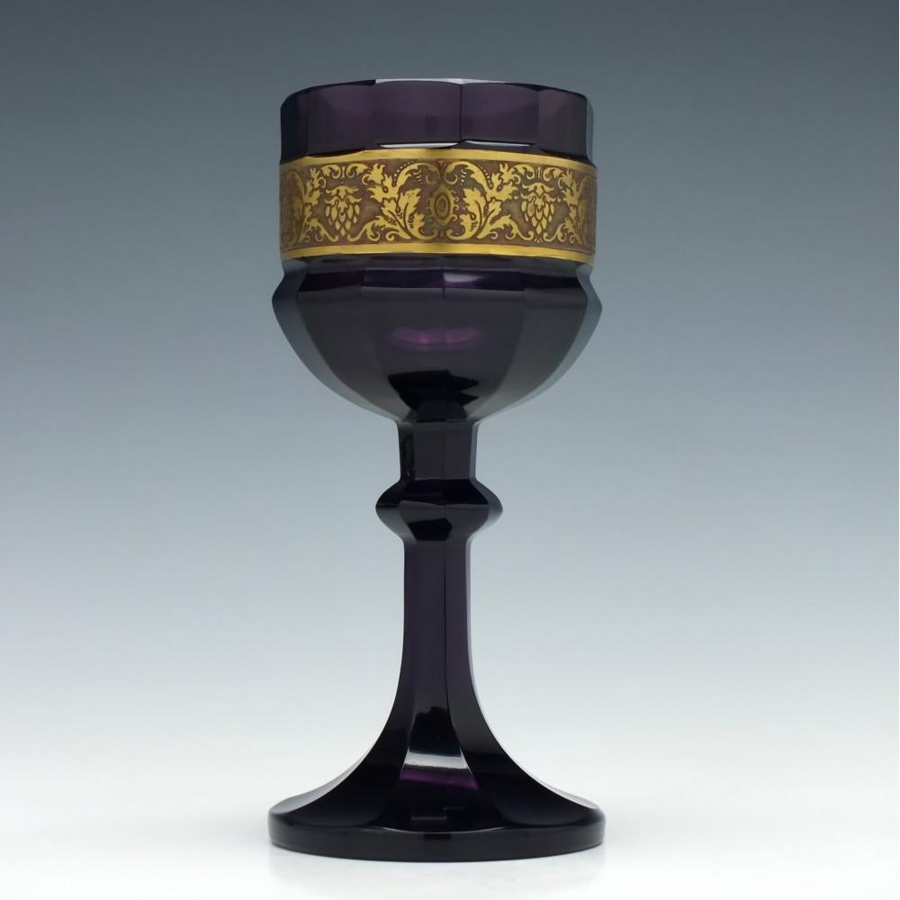 Six large Moser amethyst wine goblets

Slice cut bowl decorated with a frieze

Signed Moser Karlsbad

circa 1910-1926

The type of frieze is known as “oroplastique”, a method first developed by Val Saint Lambert and also used by Moser and