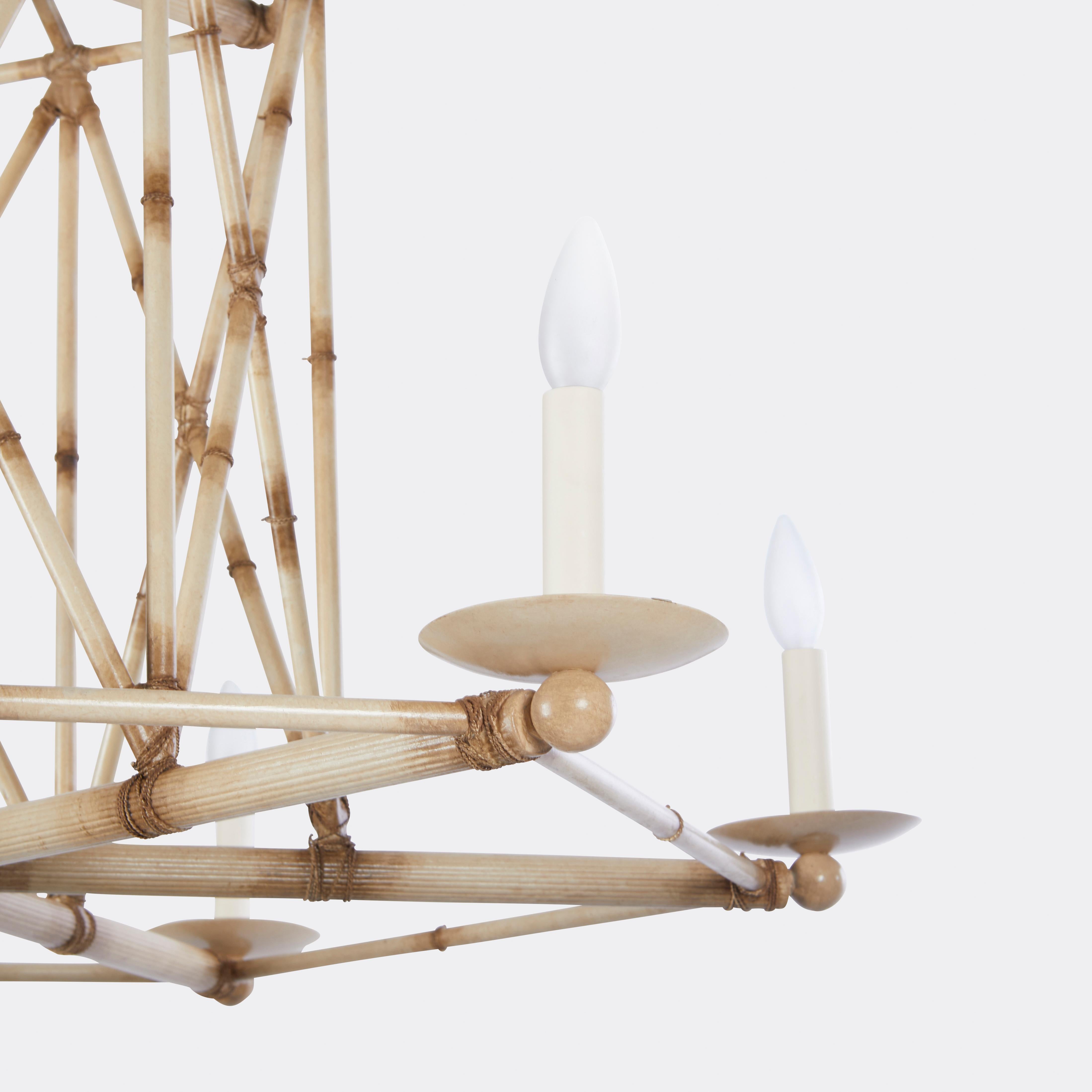 A six light faux bamboo chandelier, by David Duncan Lighting. This chandelier features a playfully intricate geometric structure, formed by crossbanded sections of hand painted brass. These hand painted details are also used to create a scorched