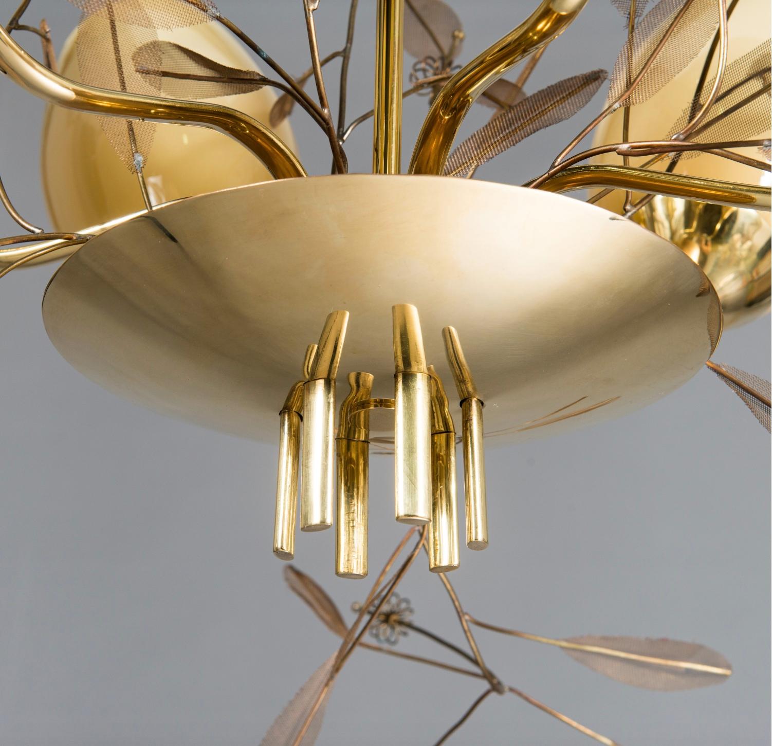 A chandeliers designed by Paavo Tynell for Taito Oy, Finland. Model 