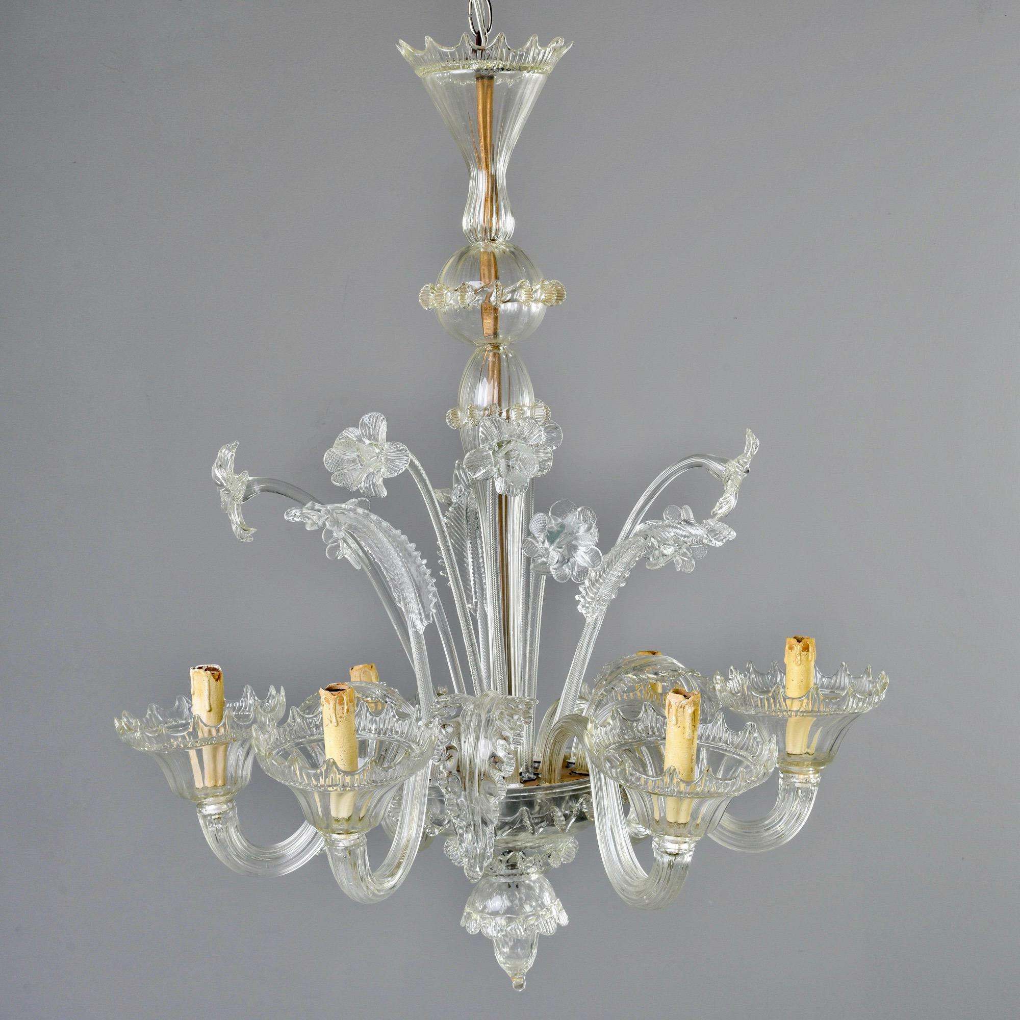 Six-arm clear Venetian glass chandelier with one-tier of daffodils and leaves and a hand blown glass shaft and canopy, circa 1940s. New wiring for US electrical standards.