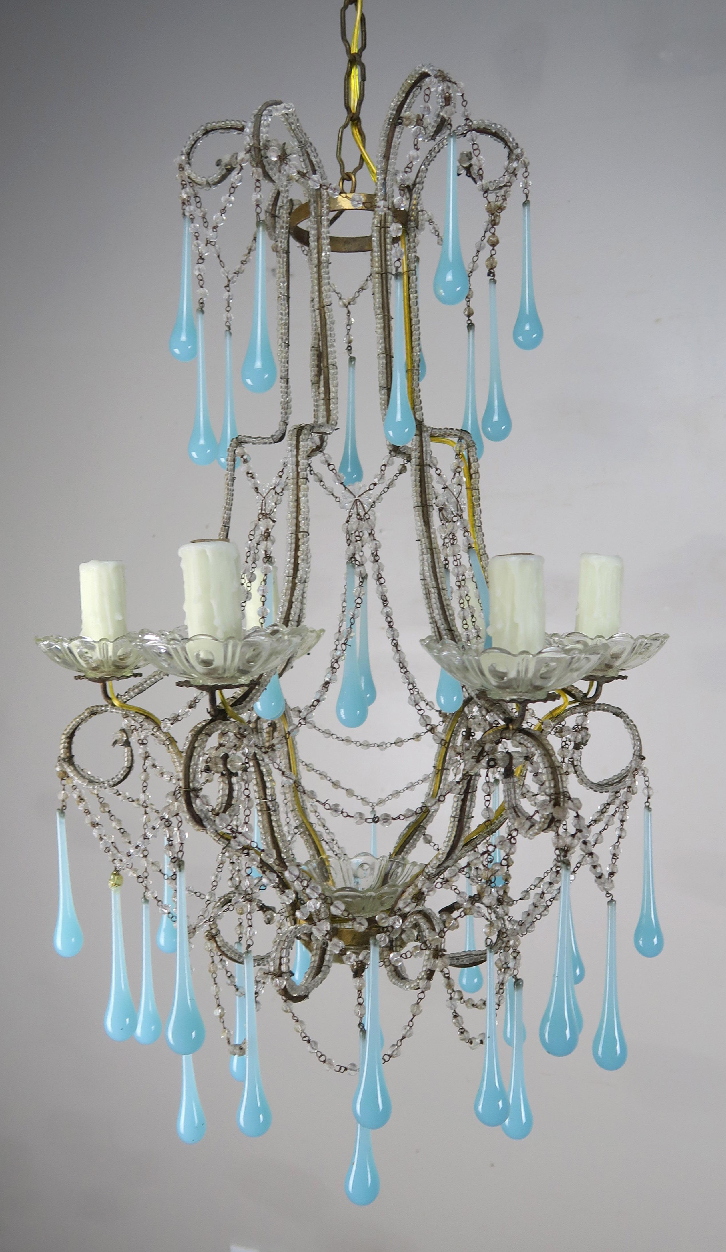 Six-light crystal beaded chandelier with long aqua hand blown glass drops. The chandelier is draped with garlands of English cut beads. We have had the fixture newly rewired with drip wax candle covers. The chandelier includes chain adn canopy and