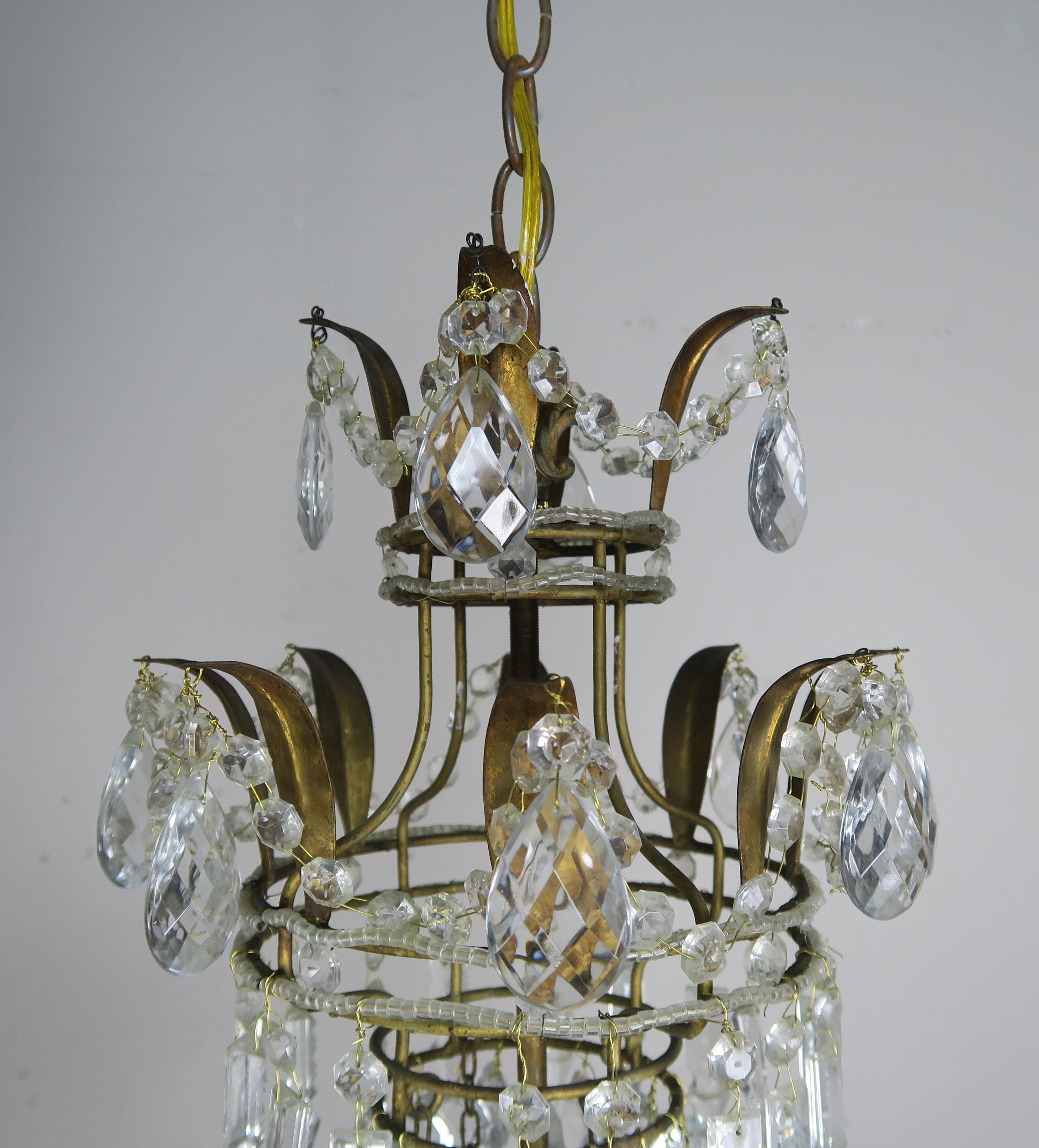 Louis XV Six Light French Gilt Metal Crystal Beaded Chandelier, circa 1900s