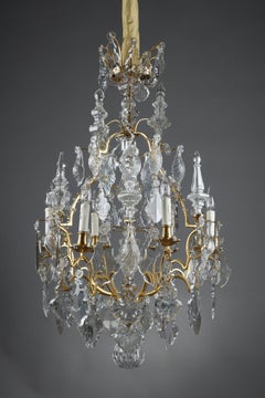 Six-light gilt bronze cage Chandelier with cut crystal pendants and daggers