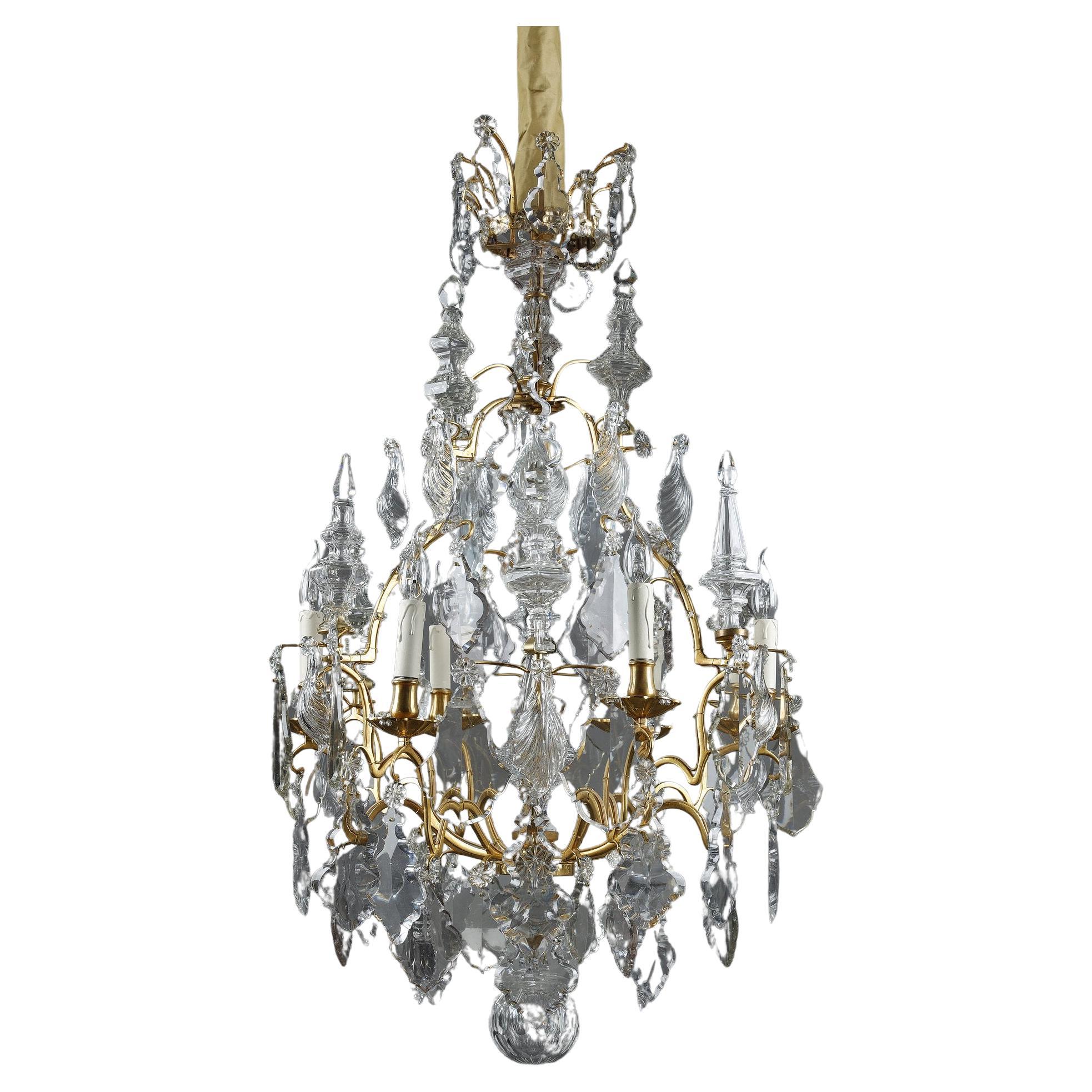 Six-light gilt bronze cage Chandelier with cut crystal pendants and daggers For Sale