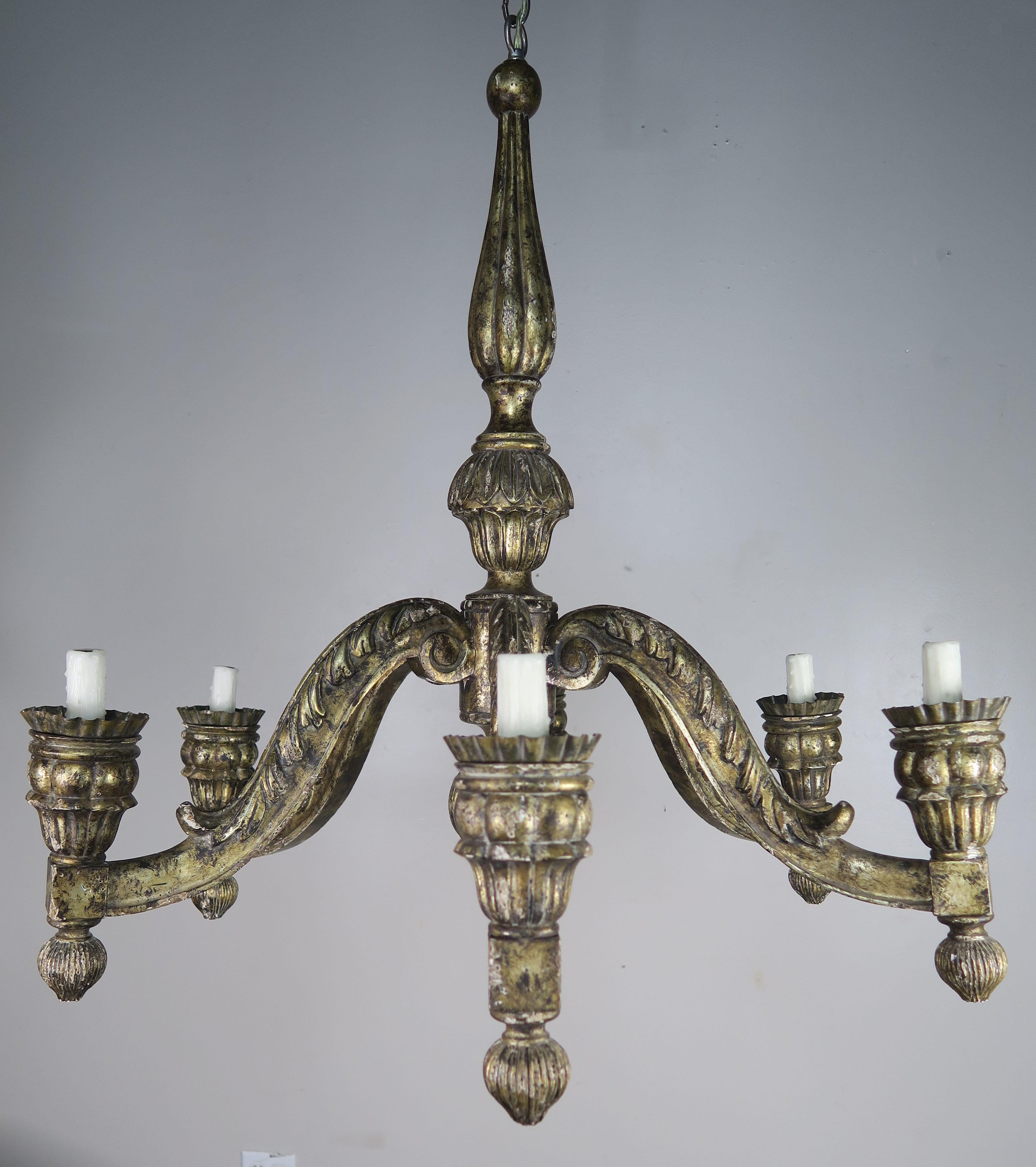 Six-light Italian carved wood chandelier finished in a silvery gold 