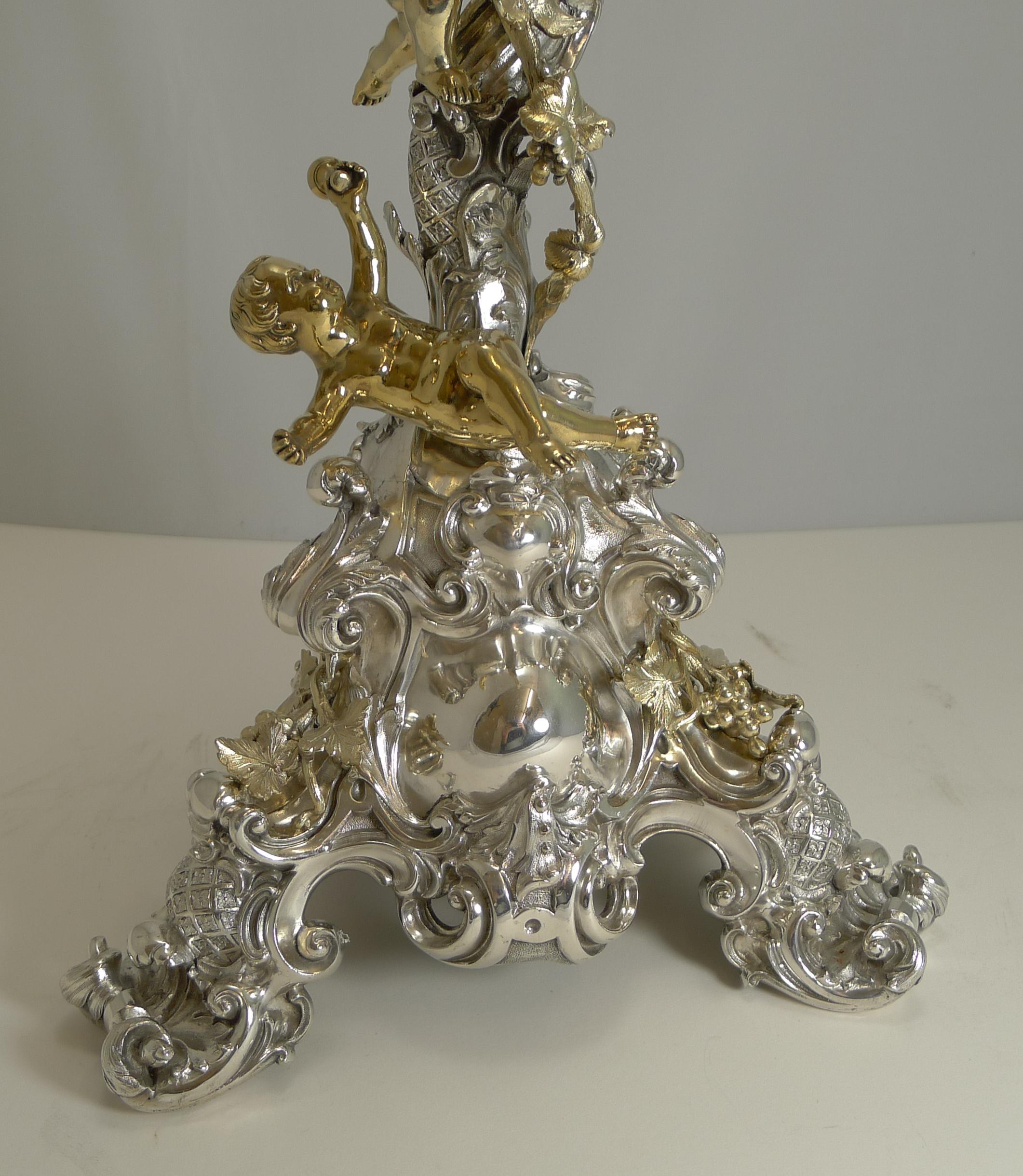 A most important antique English silver plated centerpiece / six-light candelabra by the top-notch silversmith, Elkington and Co. with a date letter (F) for the year 1868.

In the Rococo revival style with abundant scroll and acanthus leaf