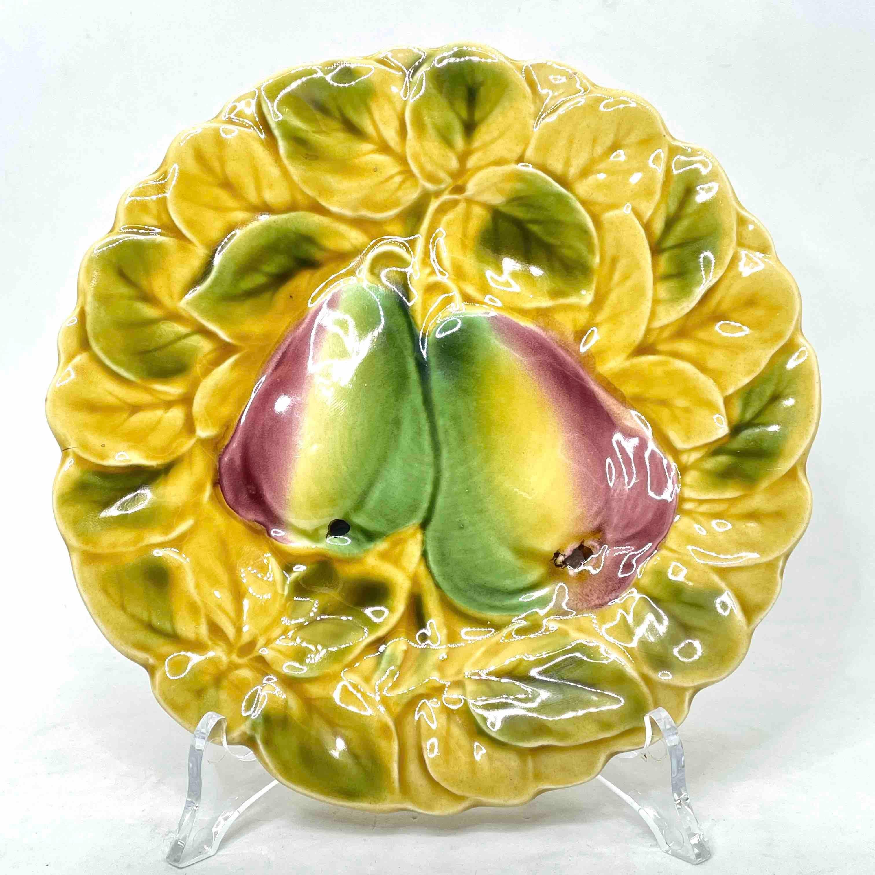Six Early 20th century majolica plates with fruit decor, Earthenware. Differend fruit decorations, colourful painted. Underglaze mark. Small cracks in the glazing, glazing craquelure. Nice addition to your table or just to display. Please see