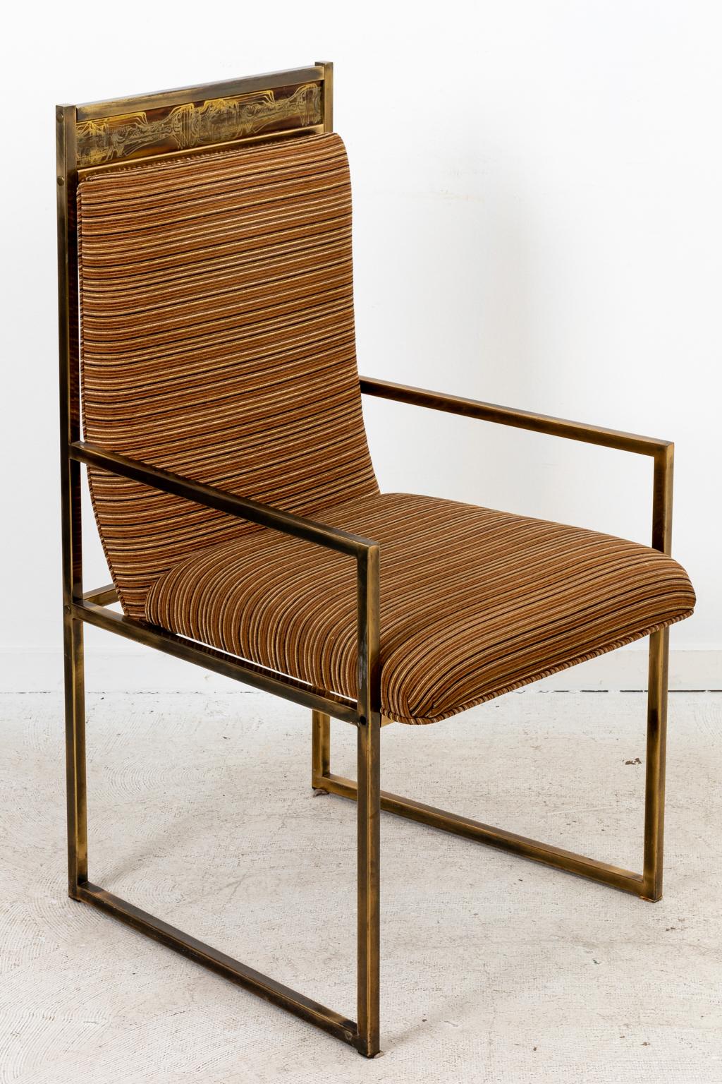 Circa 1910s six brass Mastercraft dining chairs with acid etched bronze panels by Bernhard Rohne with upholstered seats and backs. The upholstery is in excellent condition. Made in the United States. Please note of wear consistent with age.