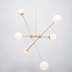 Six Matte Sphere Articulating Satin Brass Pendant