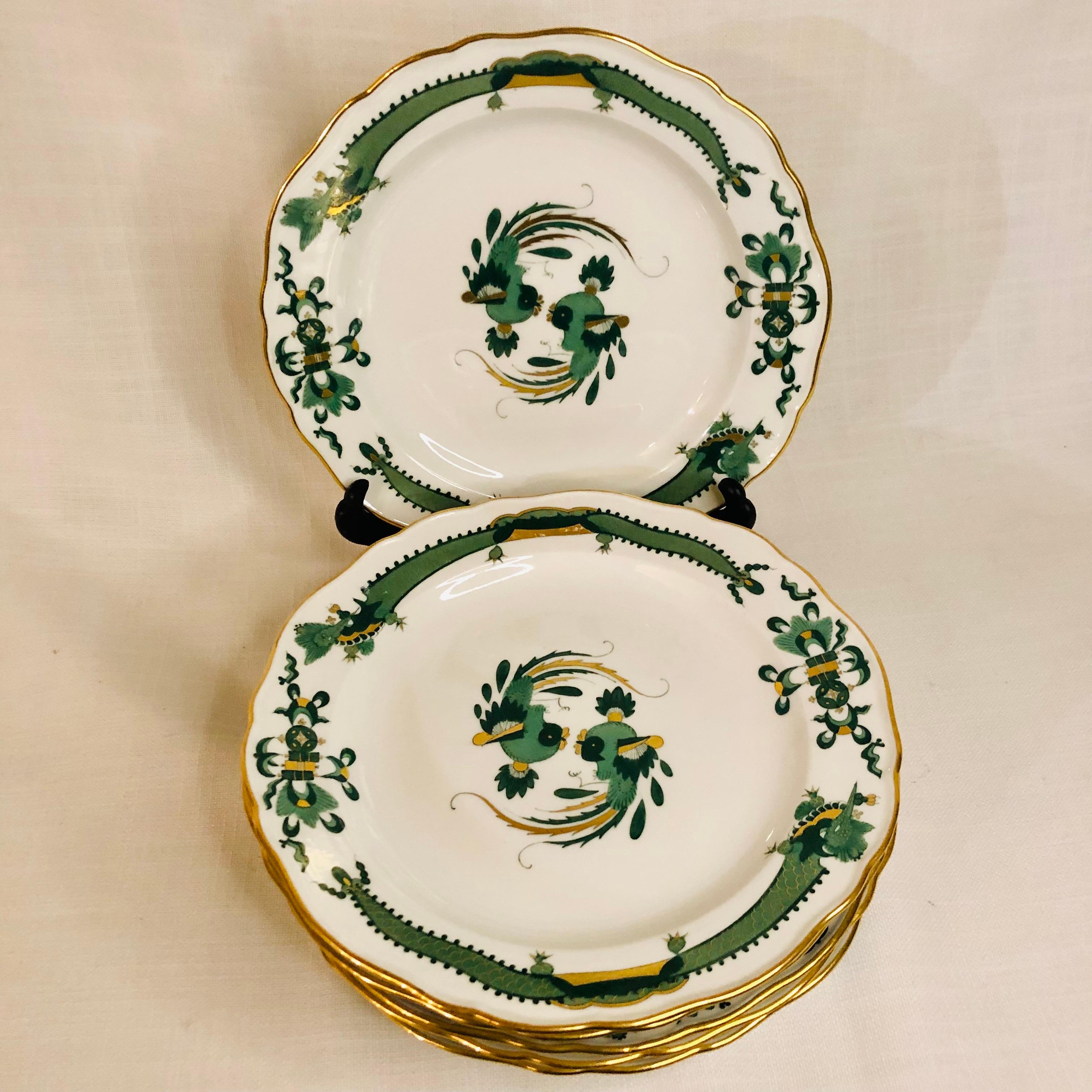 I want to offer you this set of six Meissen green court dragon dessert or luncheon plates from the 1880s-1890s. These plates are beautifully decorated with phoenix birds and dragons with gold accents and a gold rim. The original Meissen court dragon