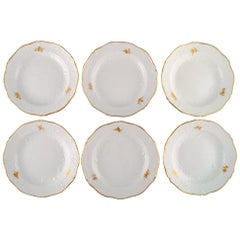 Six Meissen Plates with Flowers and Foliage in Relief and Gold Edge