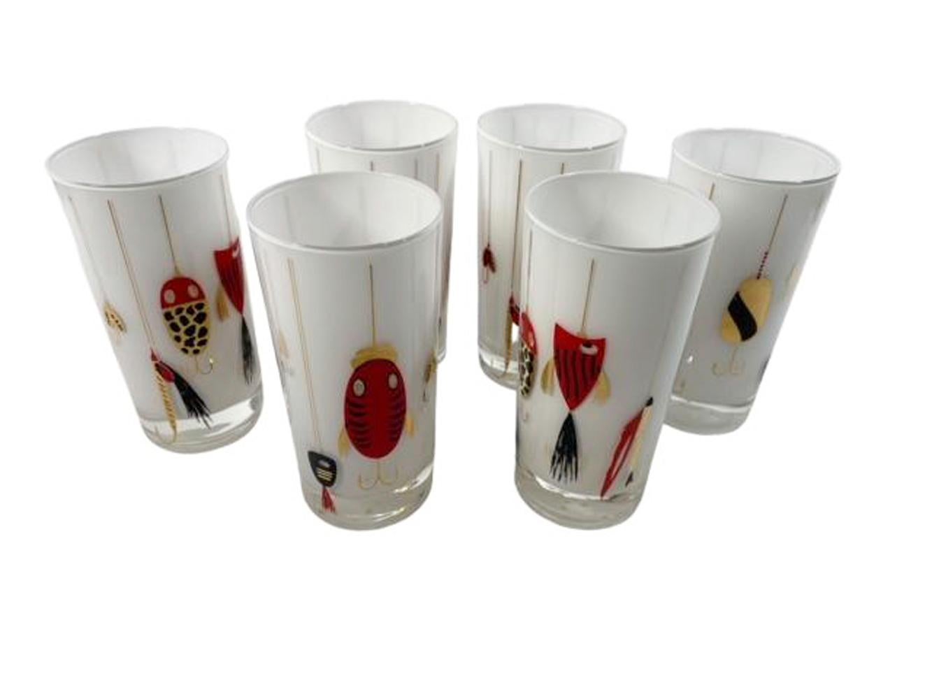 Set of six vintage highball glasses of clear glass with white frosted interior and decorated with a design by Robert Meth in 22 karat gold and colored enamels, having fishing lures hanging on gold leads with raised textured surfaces in red, black