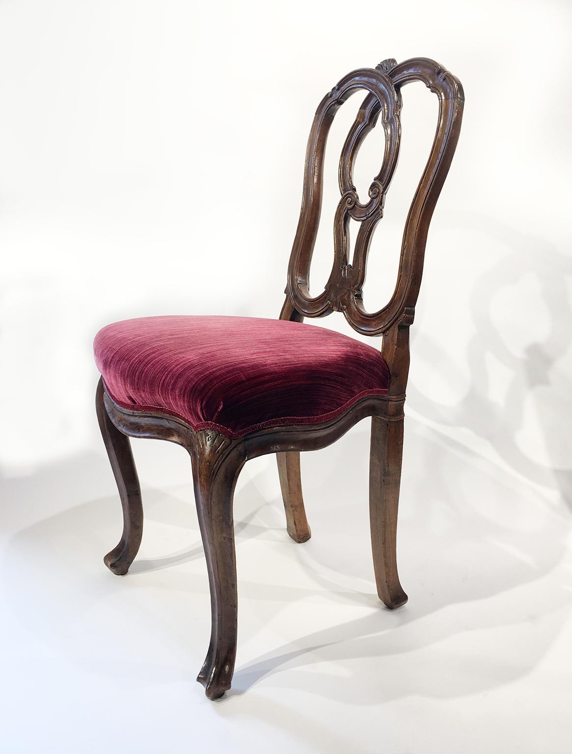 Six carved walnut chairs
Venice, mid-18th century
Height 35.03 in (18.70 in to the seat) x 19.09 in x 18.30 in 
(89 cm - 47.5 cm to the seat - x 48.5 cm x 46.5 cm)
lb 80 (kg 36)
State of conservation: slight chipping on the edges and some signs of