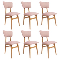 Six chaises de salle à manger papillon du milieu du siècle, lin rose, bois clair, Europe, années 1960