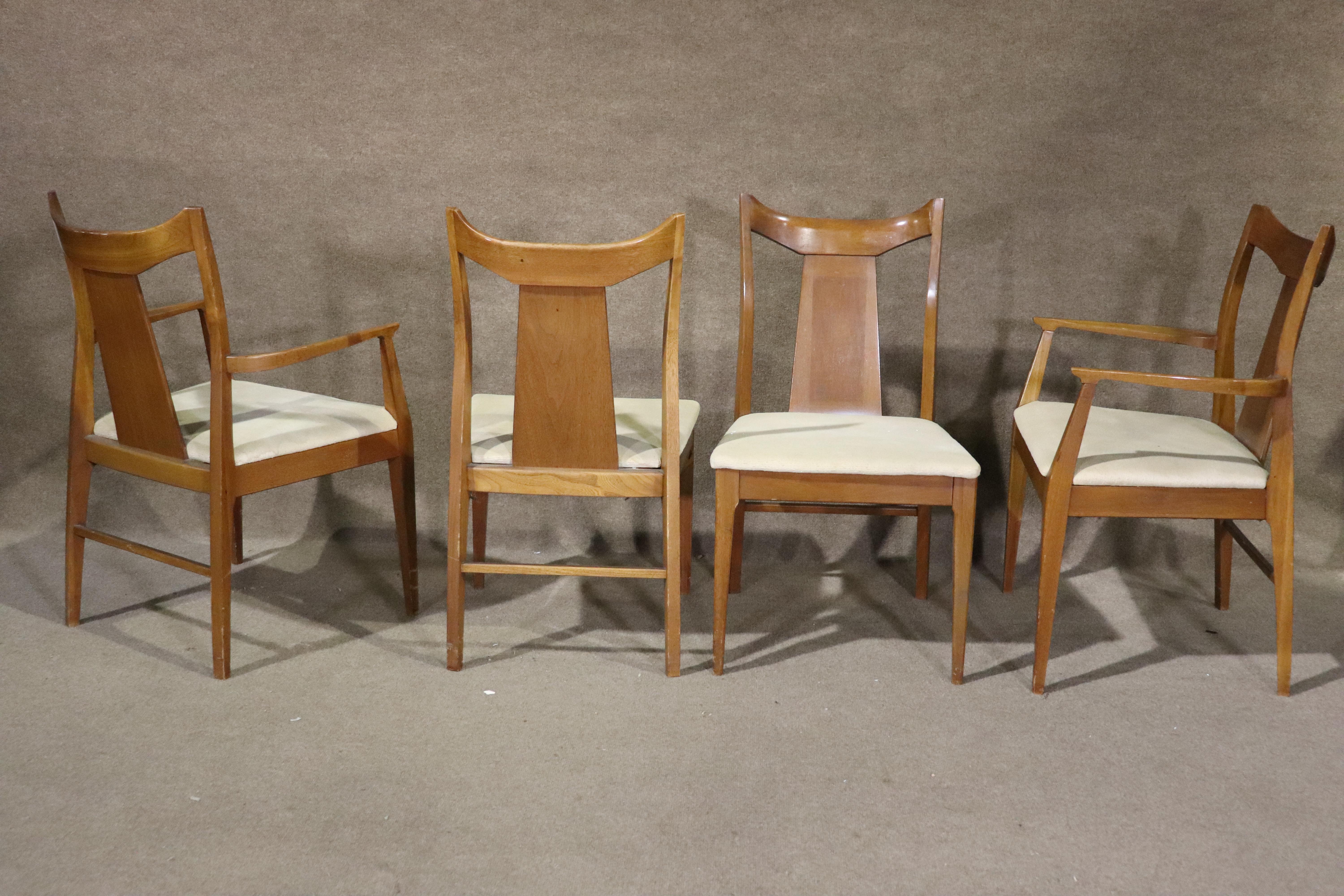 Set of six mid-century modern walnut frame dining chairs. Great vintage style with sculpted frames and tan seats.
Arm chairs: 35.5h, 23w, 22d
Side chairs: 35.5h, 19.5w, 21d
Please confirm location NY or NJ