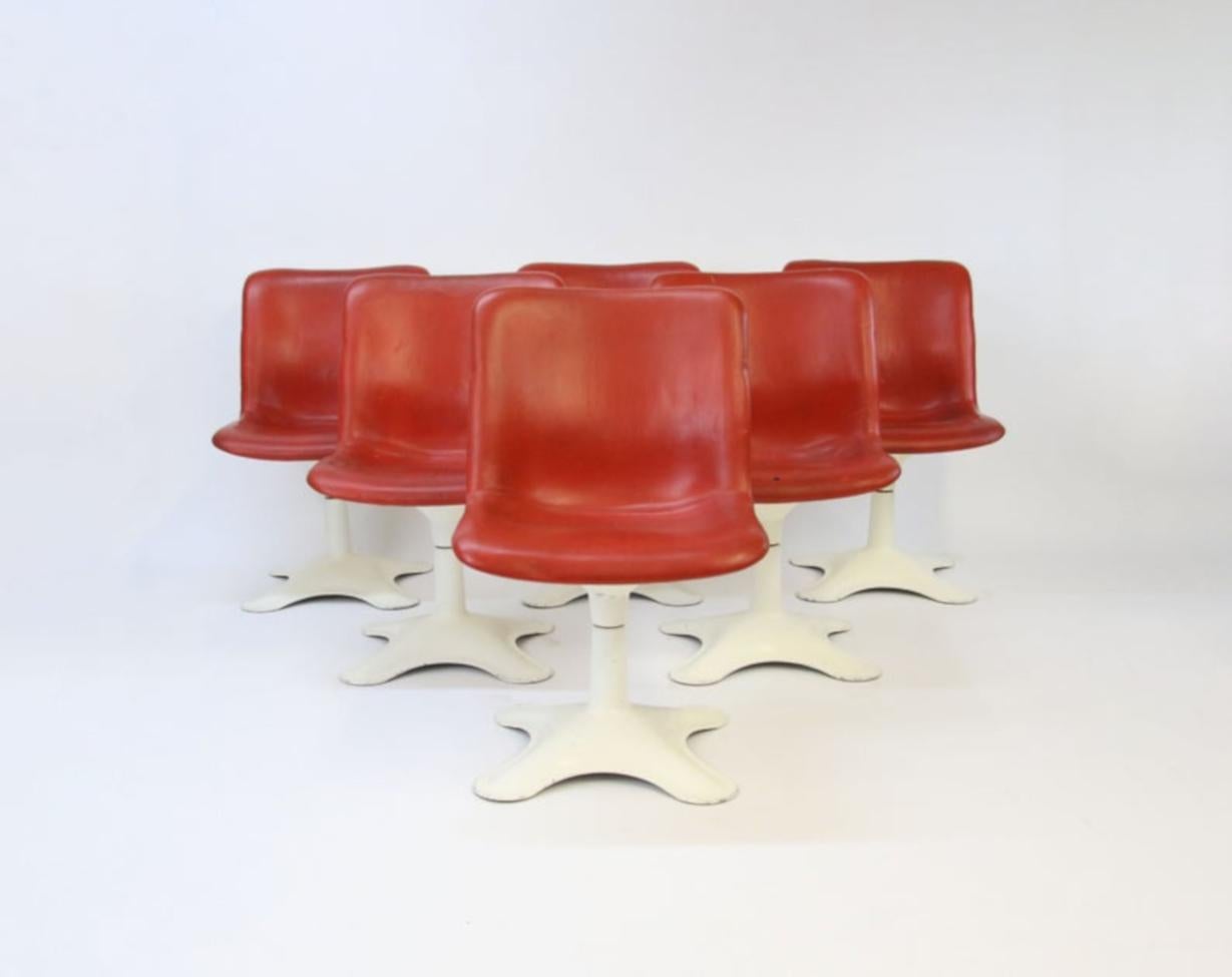 This is a very uncommon set of six dining chairs by Yrjö Kukkapuro for Haimi in Finland, circa 1960s. Swivel bases. 100% original. All chairs are labeled.
Imported from Scandinavia. All the chairs are in the original red leather. The white finish