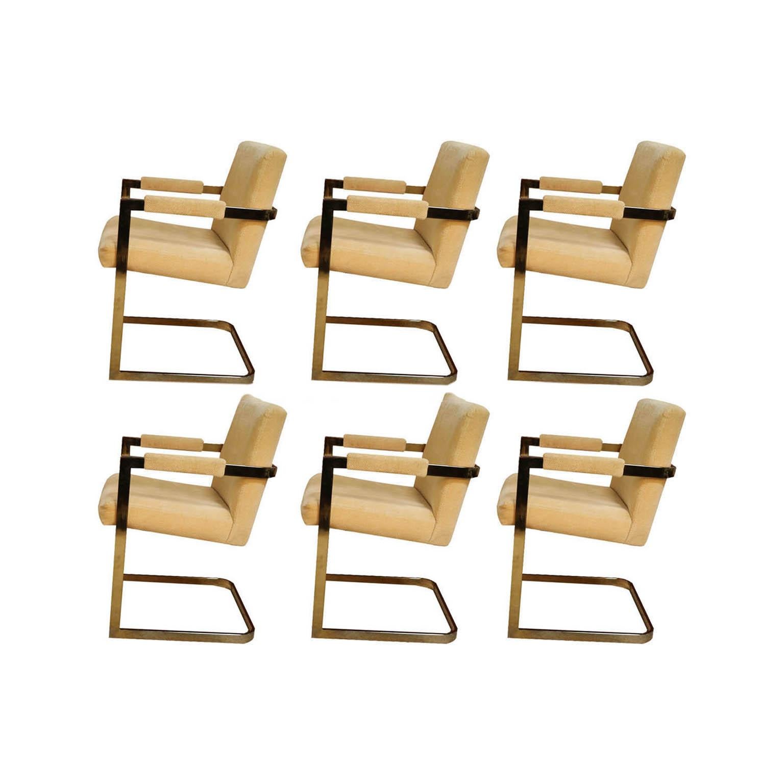 A stunning attractive set of six brass cantilever dining or side, armchairs designed by Milo Baughman for Thayer Coggin model #1188, are of midcentury form, sophisticated and elegant featuring soft padded back and seat over sculptural cantilevered