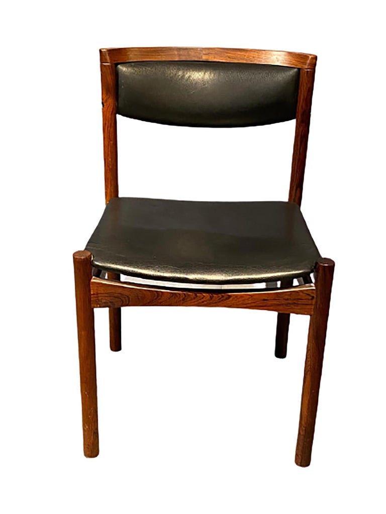 Six Mid-Century Modern Danish dining chairs by Soro Stolefabrik. Each branded SAX Made in Denmark. These finely constructed dining chairs have clean upholstery and sit on strong sturdy frames of rosewood. If you are going in the Danish or midcentury