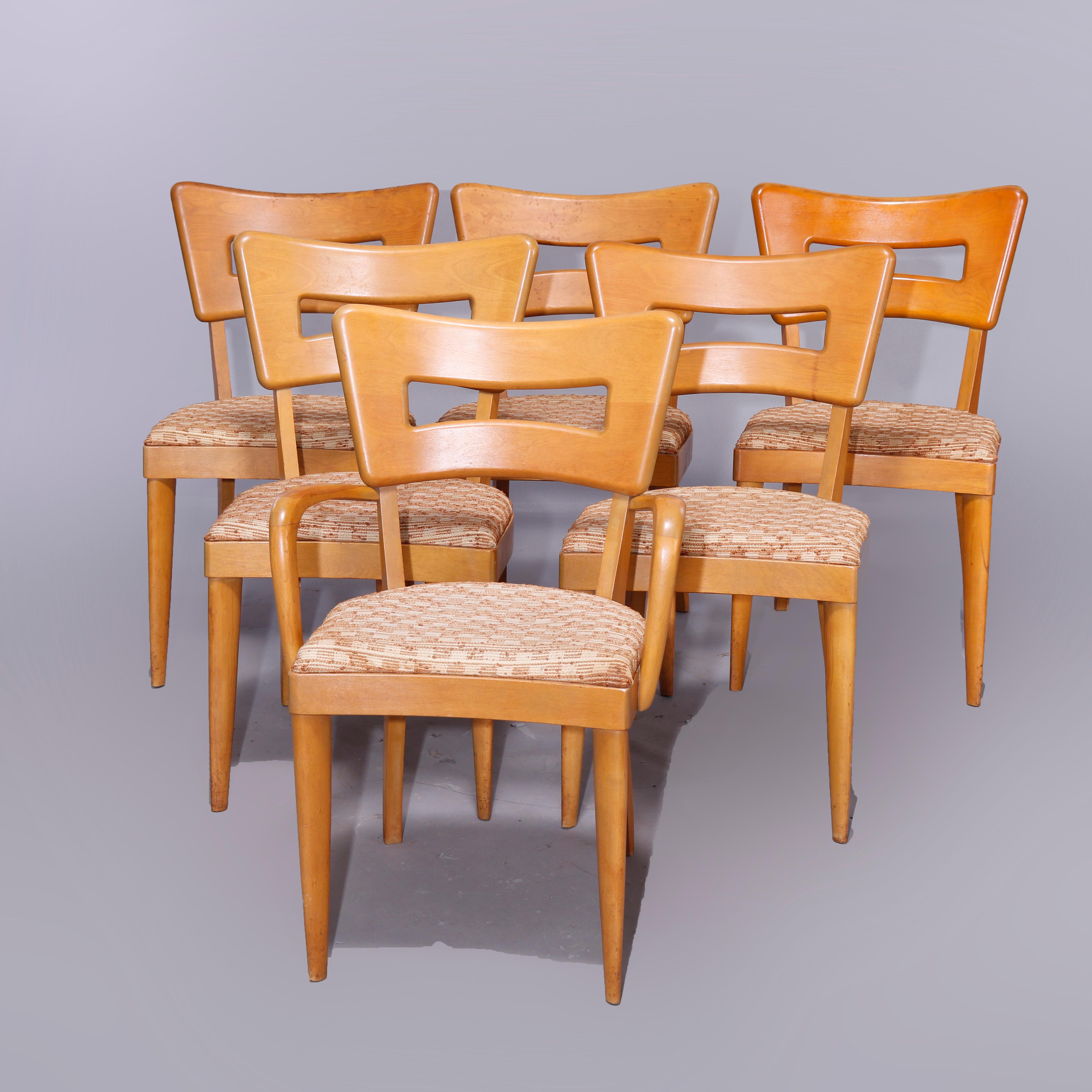 A Mid-Century Modern set of six dining chairs by Heywood Wakefield in the Dog Bone (Wish Bone) pattern offer birch construction in Wheat finish, maker mark as photographed, c1950

Measures- 33'' H x 22'' W x 22'' D. 

 