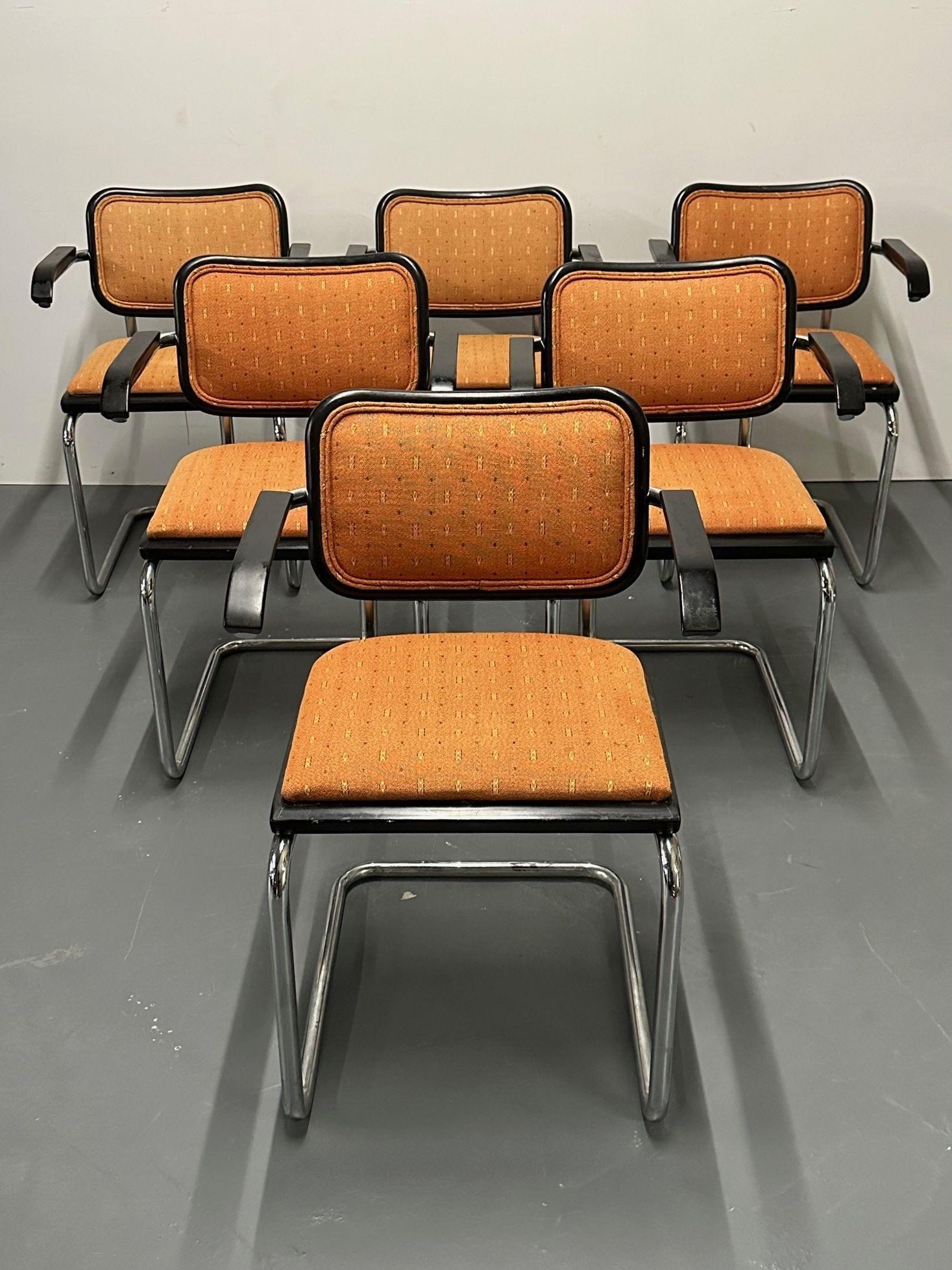 Six Mid-Century Modern Marcel Breuer for Knoll Cesca Chairs, Lacquer, 1960s
 
Set of six 'Cesca' chairs designed by Marcel Breuer for Knoll International. Each chair maintains it's original chrome frame, lacquer finishing, upholstery, and