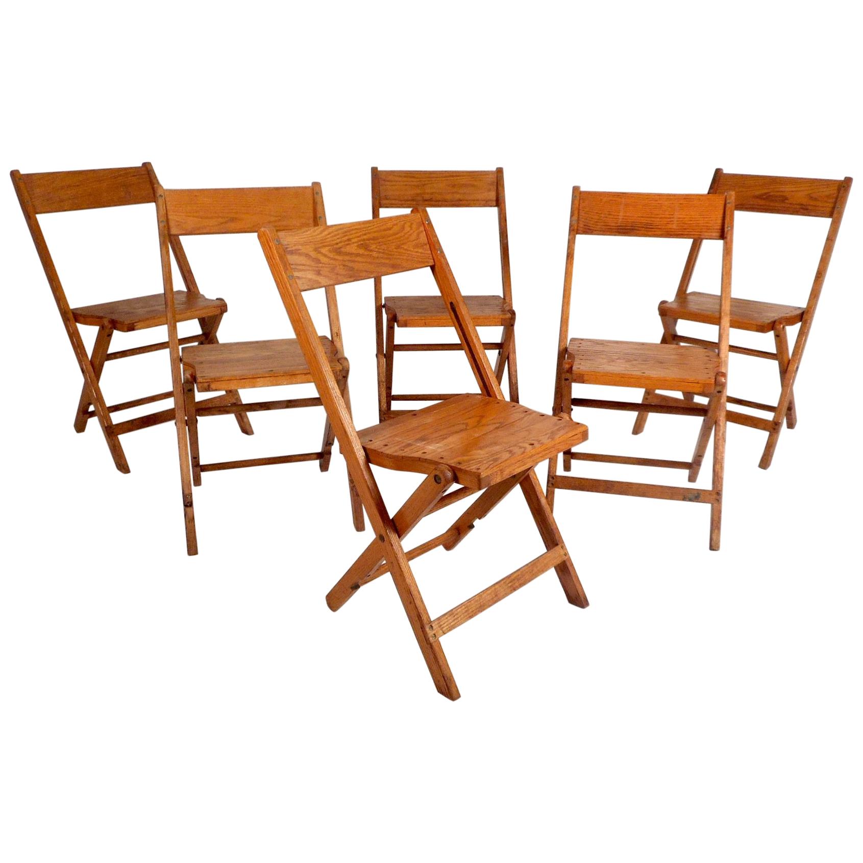 Six Mid-Century Modern Oak Folding Chairs by Snyder Chair Co.