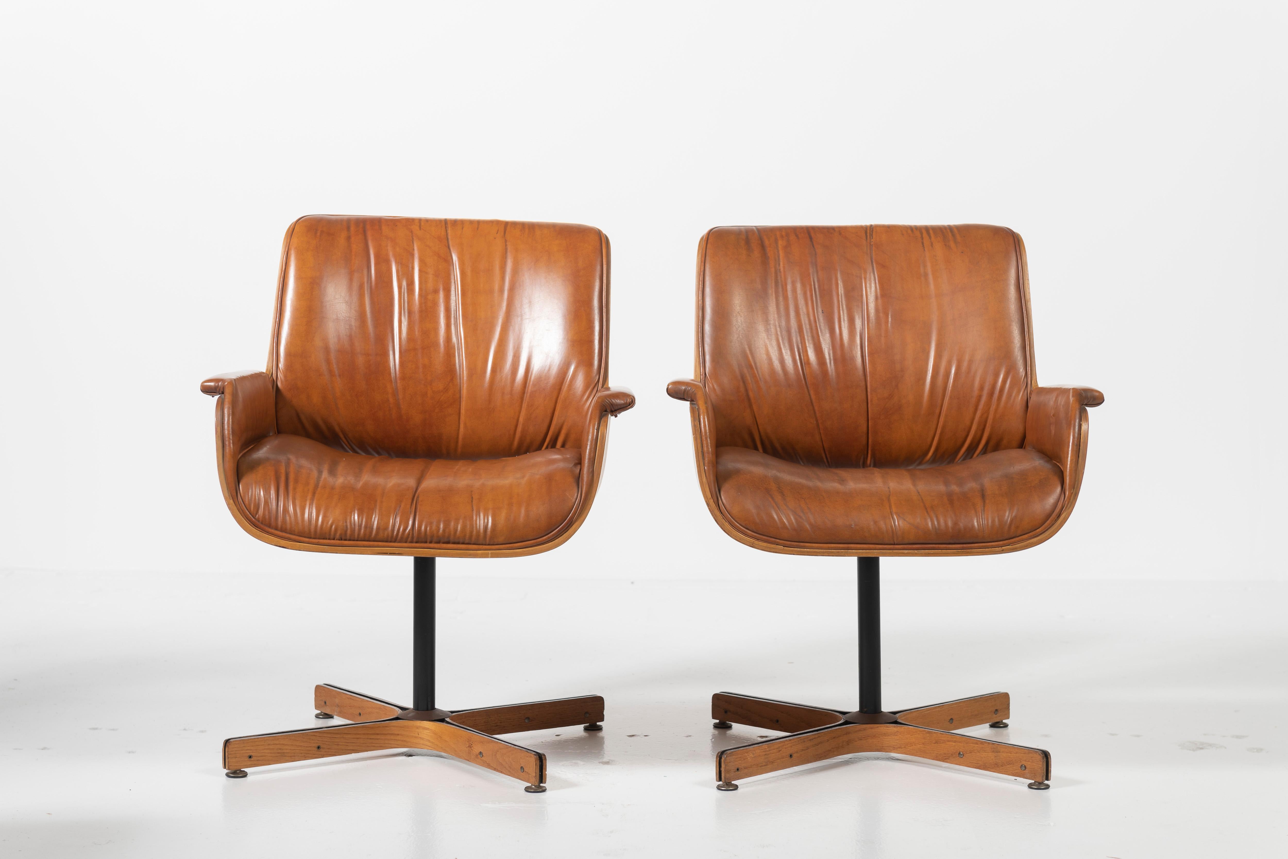 Pair of Mid-Century Modern Swivel Faux Leather and Wood Armchairs by Plycraft 3
