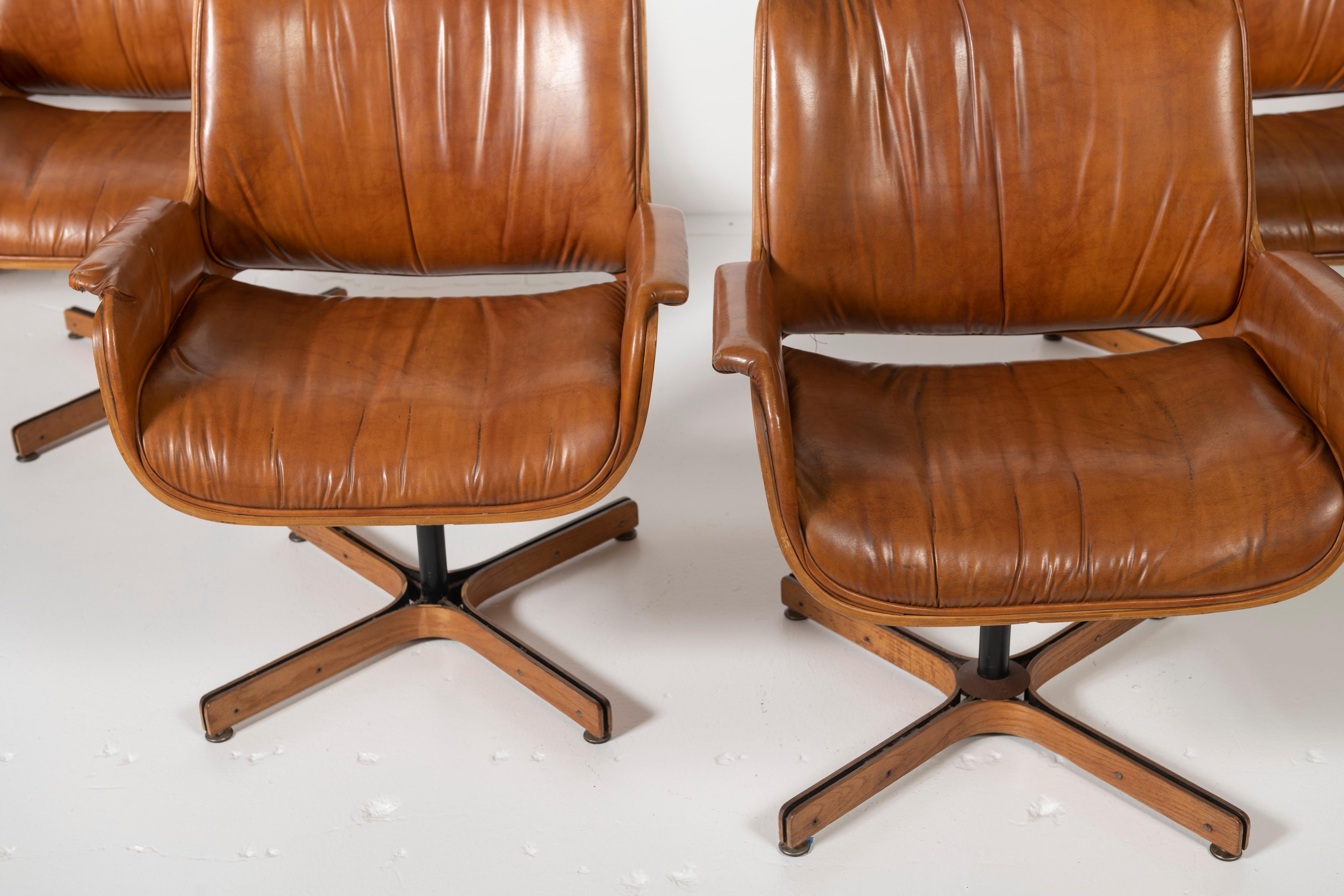 Pair of Mid-Century Modern Swivel Faux Leather and Wood Armchairs by Plycraft 4